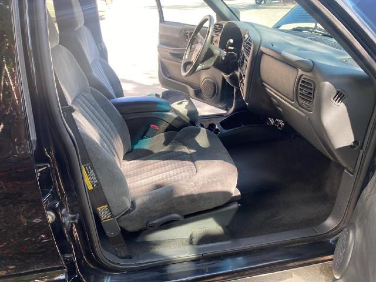 2002 Onyx Black /Medium Gray Chevrolet Blazer LS 4WD LOW MILES 35,402 (1GNDT13W62K) with an 4.3L Vortec 1000 SFI V6 Engine engine, Automatic transmission, located at 4701 North Dixie Hwy, Pompano Beach, FL, 33064, (954) 422-2889, 26.240938, -80.123474 - OUR WEBPAGE FLORIDACARS1.COM HAS OVER 100 PHOTOS AND FREE CARFAX LINK 2002 CHEVROLET BLAZER LS VIN: 1GNDT13W62K130832 1 G N D T 1 3 W 6 2 K 1 3 0 8 3 2 4 DOOR WAGON/SPORT UTILITY 4.3L V6 F OHV 12V GASOLINE REAR WHEEL DRIVE W/ 4X4 Top Features 4WD/AWD Cloth Seats Alloy Wheels Tow Hitch Basic Features - Photo#12
