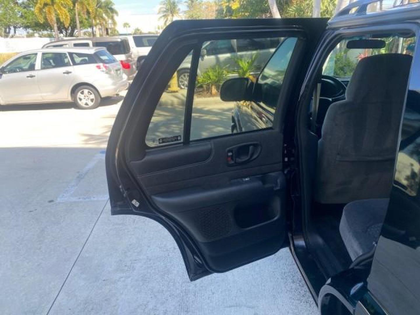 2002 Onyx Black /Medium Gray Chevrolet Blazer LS 4WD LOW MILES 35,402 (1GNDT13W62K) with an 4.3L Vortec 1000 SFI V6 Engine engine, Automatic transmission, located at 4701 North Dixie Hwy, Pompano Beach, FL, 33064, (954) 422-2889, 26.240938, -80.123474 - OUR WEBPAGE FLORIDACARS1.COM HAS OVER 100 PHOTOS AND FREE CARFAX LINK 2002 CHEVROLET BLAZER LS VIN: 1GNDT13W62K130832 1 G N D T 1 3 W 6 2 K 1 3 0 8 3 2 4 DOOR WAGON/SPORT UTILITY 4.3L V6 F OHV 12V GASOLINE REAR WHEEL DRIVE W/ 4X4 Top Features 4WD/AWD Cloth Seats Alloy Wheels Tow Hitch Basic Features - Photo#13