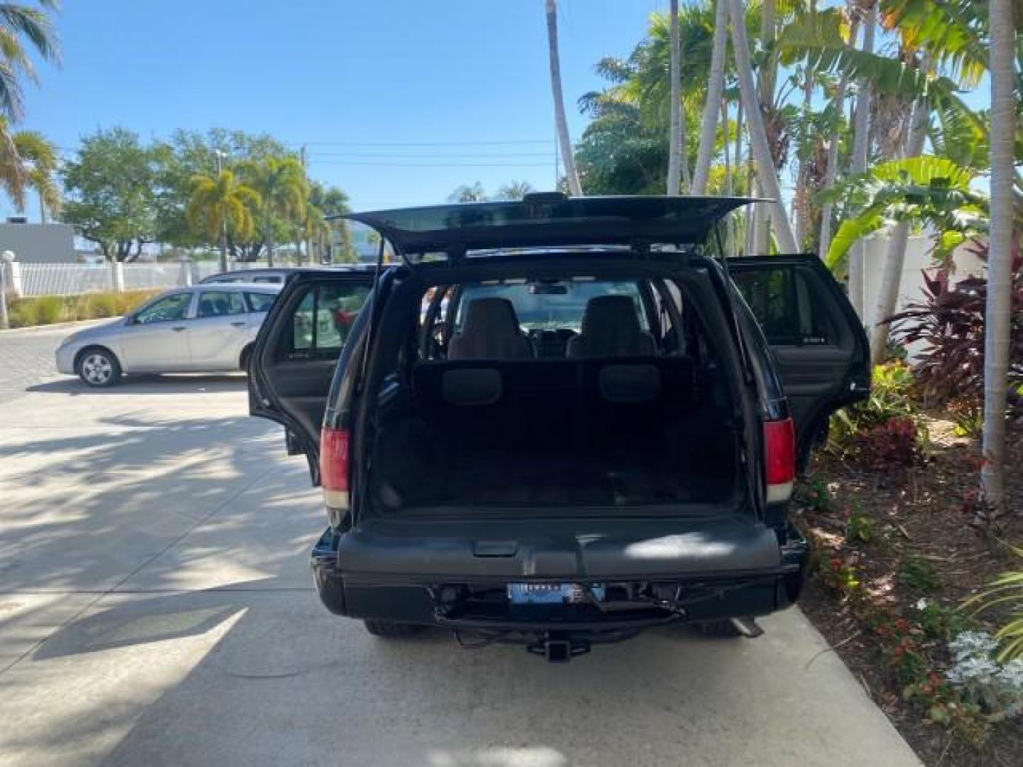 2002 Onyx Black /Medium Gray Chevrolet Blazer LS 4WD LOW MILES 35,402 (1GNDT13W62K) with an 4.3L Vortec 1000 SFI V6 Engine engine, Automatic transmission, located at 4701 North Dixie Hwy, Pompano Beach, FL, 33064, (954) 422-2889, 26.240938, -80.123474 - OUR WEBPAGE FLORIDACARS1.COM HAS OVER 100 PHOTOS AND FREE CARFAX LINK 2002 CHEVROLET BLAZER LS VIN: 1GNDT13W62K130832 1 G N D T 1 3 W 6 2 K 1 3 0 8 3 2 4 DOOR WAGON/SPORT UTILITY 4.3L V6 F OHV 12V GASOLINE REAR WHEEL DRIVE W/ 4X4 Top Features 4WD/AWD Cloth Seats Alloy Wheels Tow Hitch Basic Features - Photo#15