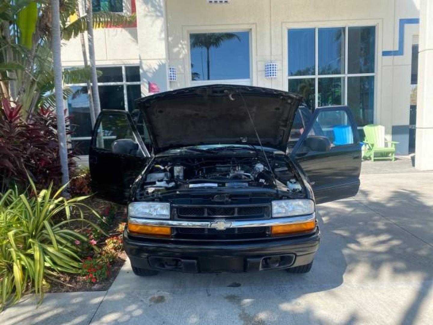 2002 Onyx Black /Medium Gray Chevrolet Blazer LS 4WD LOW MILES 35,402 (1GNDT13W62K) with an 4.3L Vortec 1000 SFI V6 Engine engine, Automatic transmission, located at 4701 North Dixie Hwy, Pompano Beach, FL, 33064, (954) 422-2889, 26.240938, -80.123474 - OUR WEBPAGE FLORIDACARS1.COM HAS OVER 100 PHOTOS AND FREE CARFAX LINK 2002 CHEVROLET BLAZER LS VIN: 1GNDT13W62K130832 1 G N D T 1 3 W 6 2 K 1 3 0 8 3 2 4 DOOR WAGON/SPORT UTILITY 4.3L V6 F OHV 12V GASOLINE REAR WHEEL DRIVE W/ 4X4 Top Features 4WD/AWD Cloth Seats Alloy Wheels Tow Hitch Basic Features - Photo#16