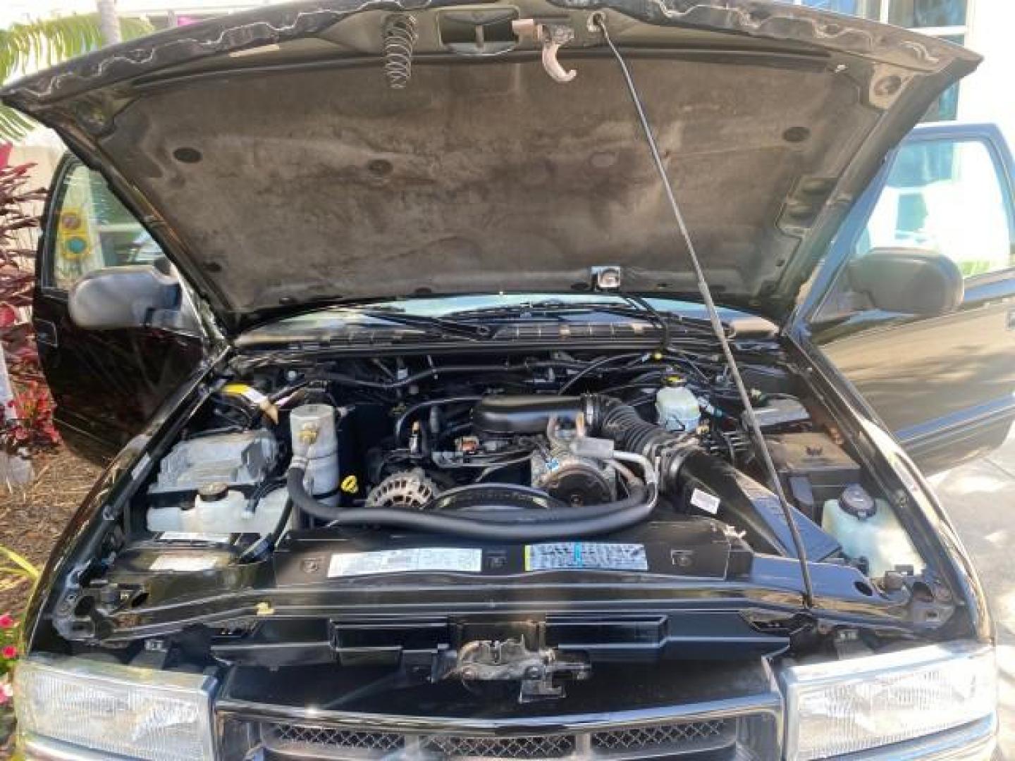2002 Onyx Black /Medium Gray Chevrolet Blazer LS 4WD LOW MILES 35,402 (1GNDT13W62K) with an 4.3L Vortec 1000 SFI V6 Engine engine, Automatic transmission, located at 4701 North Dixie Hwy, Pompano Beach, FL, 33064, (954) 422-2889, 26.240938, -80.123474 - OUR WEBPAGE FLORIDACARS1.COM HAS OVER 100 PHOTOS AND FREE CARFAX LINK 2002 CHEVROLET BLAZER LS VIN: 1GNDT13W62K130832 1 G N D T 1 3 W 6 2 K 1 3 0 8 3 2 4 DOOR WAGON/SPORT UTILITY 4.3L V6 F OHV 12V GASOLINE REAR WHEEL DRIVE W/ 4X4 Top Features 4WD/AWD Cloth Seats Alloy Wheels Tow Hitch Basic Features - Photo#17