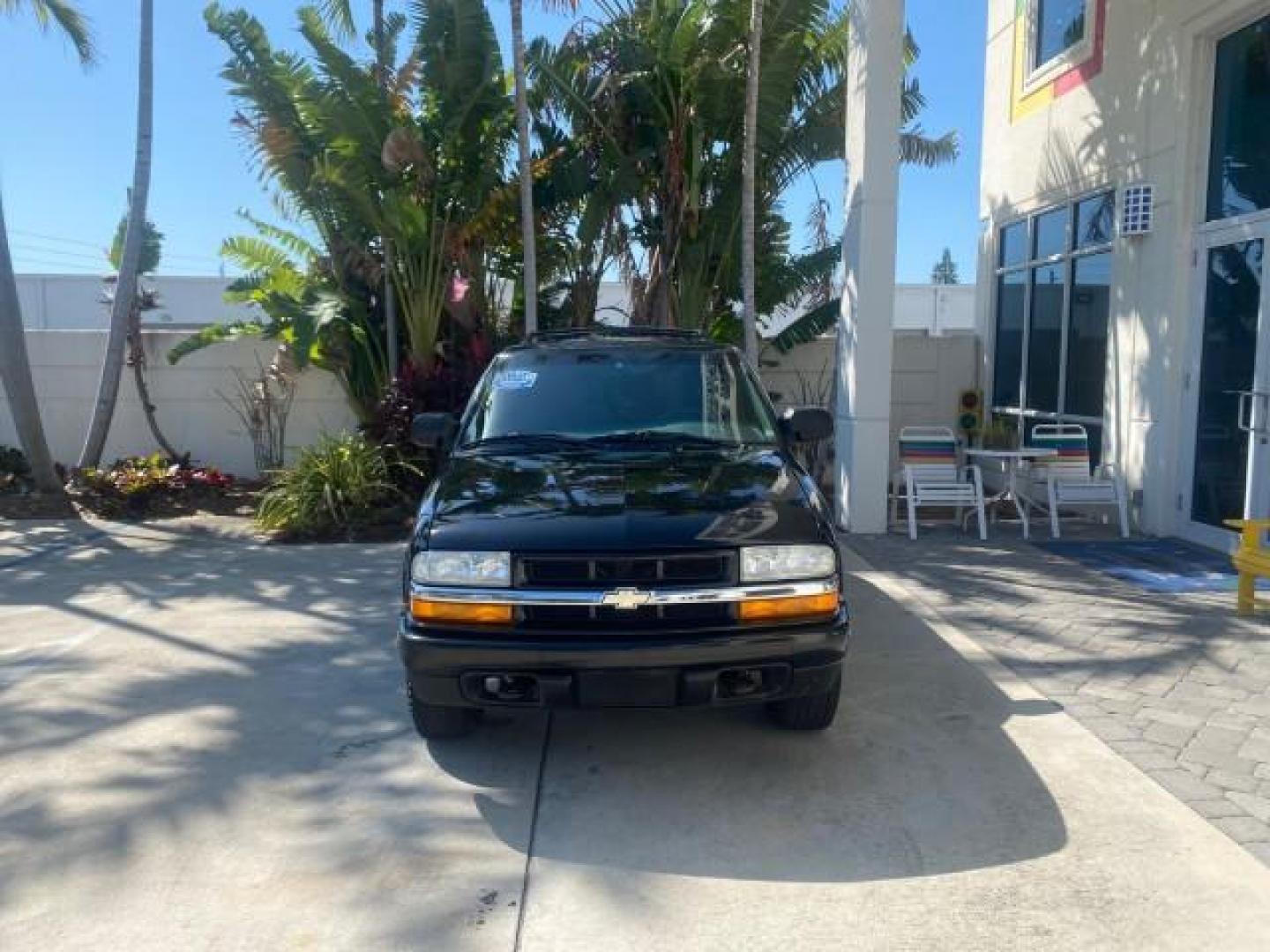 2002 Onyx Black /Medium Gray Chevrolet Blazer LS 4WD LOW MILES 35,402 (1GNDT13W62K) with an 4.3L Vortec 1000 SFI V6 Engine engine, Automatic transmission, located at 4701 North Dixie Hwy, Pompano Beach, FL, 33064, (954) 422-2889, 26.240938, -80.123474 - OUR WEBPAGE FLORIDACARS1.COM HAS OVER 100 PHOTOS AND FREE CARFAX LINK 2002 CHEVROLET BLAZER LS VIN: 1GNDT13W62K130832 1 G N D T 1 3 W 6 2 K 1 3 0 8 3 2 4 DOOR WAGON/SPORT UTILITY 4.3L V6 F OHV 12V GASOLINE REAR WHEEL DRIVE W/ 4X4 Top Features 4WD/AWD Cloth Seats Alloy Wheels Tow Hitch Basic Features - Photo#2