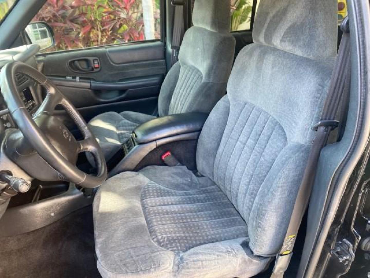 2002 Onyx Black /Medium Gray Chevrolet Blazer LS 4WD LOW MILES 35,402 (1GNDT13W62K) with an 4.3L Vortec 1000 SFI V6 Engine engine, Automatic transmission, located at 4701 North Dixie Hwy, Pompano Beach, FL, 33064, (954) 422-2889, 26.240938, -80.123474 - OUR WEBPAGE FLORIDACARS1.COM HAS OVER 100 PHOTOS AND FREE CARFAX LINK 2002 CHEVROLET BLAZER LS VIN: 1GNDT13W62K130832 1 G N D T 1 3 W 6 2 K 1 3 0 8 3 2 4 DOOR WAGON/SPORT UTILITY 4.3L V6 F OHV 12V GASOLINE REAR WHEEL DRIVE W/ 4X4 Top Features 4WD/AWD Cloth Seats Alloy Wheels Tow Hitch Basic Features - Photo#51