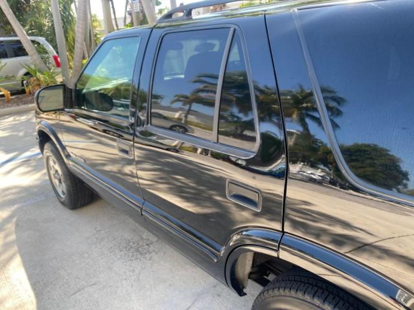 2002 Onyx Black /Medium Gray Chevrolet Blazer LS 4WD LOW MILES 35,402 (1GNDT13W62K) with an 4.3L Vortec 1000 SFI V6 Engine engine, Automatic transmission, located at 4701 North Dixie Hwy, Pompano Beach, FL, 33064, (954) 422-2889, 26.240938, -80.123474 - OUR WEBPAGE FLORIDACARS1.COM HAS OVER 100 PHOTOS AND FREE CARFAX LINK 2002 CHEVROLET BLAZER LS VIN: 1GNDT13W62K130832 1 G N D T 1 3 W 6 2 K 1 3 0 8 3 2 4 DOOR WAGON/SPORT UTILITY 4.3L V6 F OHV 12V GASOLINE REAR WHEEL DRIVE W/ 4X4 Top Features 4WD/AWD Cloth Seats Alloy Wheels Tow Hitch Basic Features - Photo#55