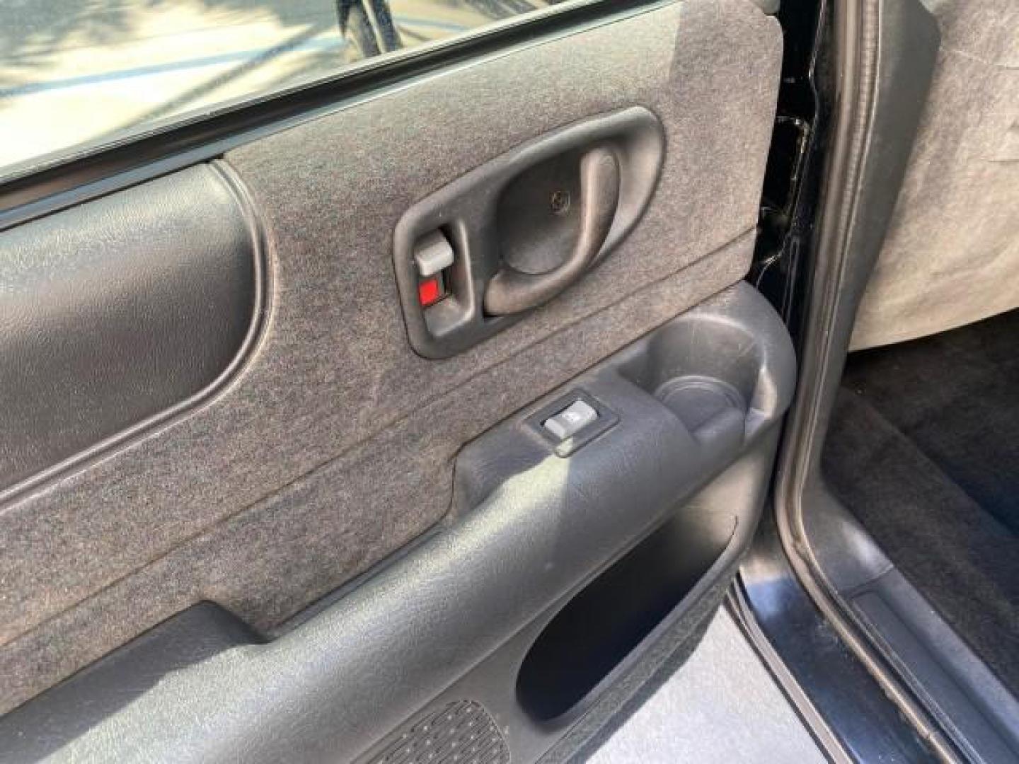 2002 Onyx Black /Medium Gray Chevrolet Blazer LS 4WD LOW MILES 35,402 (1GNDT13W62K) with an 4.3L Vortec 1000 SFI V6 Engine engine, Automatic transmission, located at 4701 North Dixie Hwy, Pompano Beach, FL, 33064, (954) 422-2889, 26.240938, -80.123474 - OUR WEBPAGE FLORIDACARS1.COM HAS OVER 100 PHOTOS AND FREE CARFAX LINK 2002 CHEVROLET BLAZER LS VIN: 1GNDT13W62K130832 1 G N D T 1 3 W 6 2 K 1 3 0 8 3 2 4 DOOR WAGON/SPORT UTILITY 4.3L V6 F OHV 12V GASOLINE REAR WHEEL DRIVE W/ 4X4 Top Features 4WD/AWD Cloth Seats Alloy Wheels Tow Hitch Basic Features - Photo#57