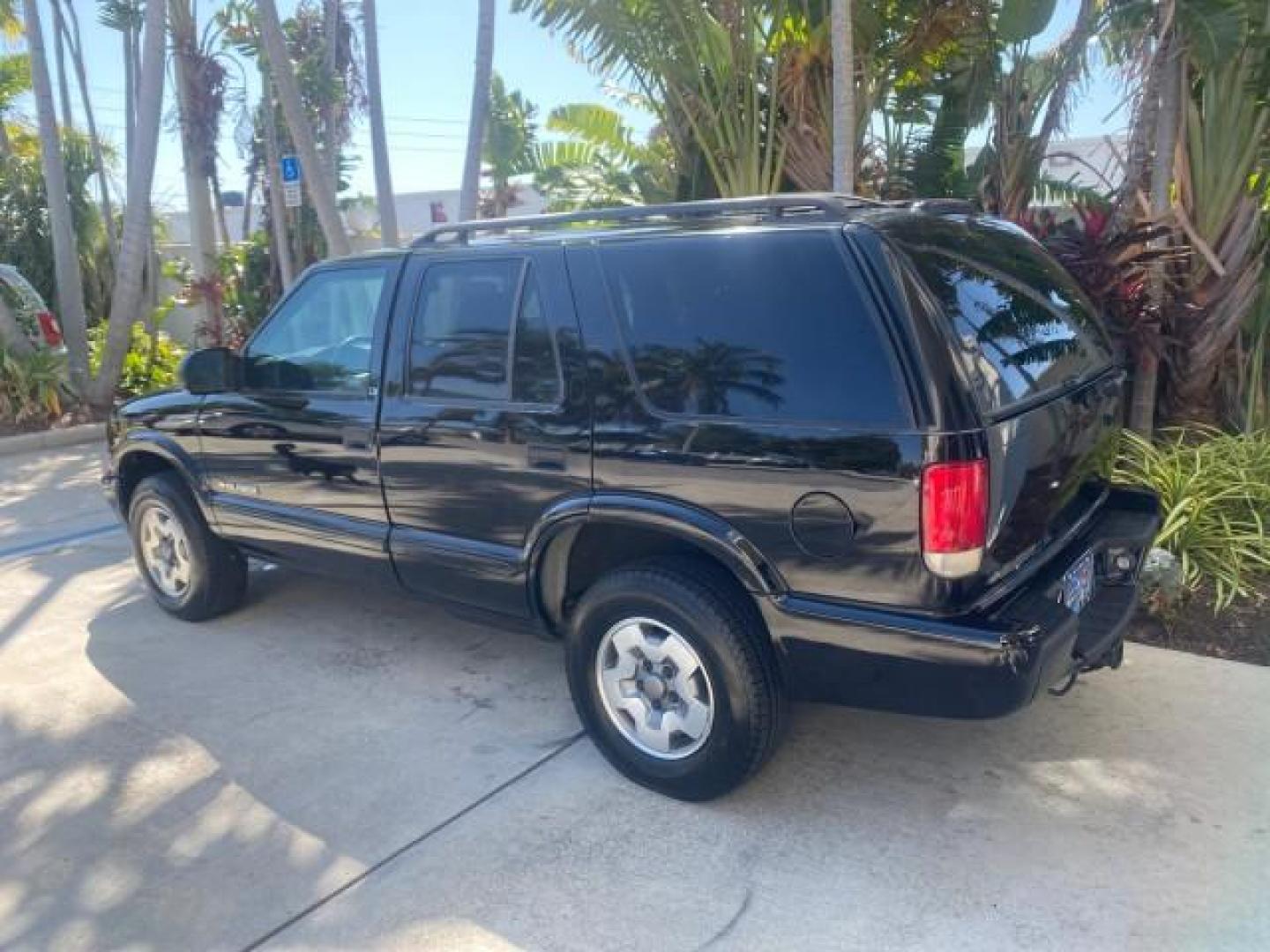 2002 Onyx Black /Medium Gray Chevrolet Blazer LS 4WD LOW MILES 35,402 (1GNDT13W62K) with an 4.3L Vortec 1000 SFI V6 Engine engine, Automatic transmission, located at 4701 North Dixie Hwy, Pompano Beach, FL, 33064, (954) 422-2889, 26.240938, -80.123474 - OUR WEBPAGE FLORIDACARS1.COM HAS OVER 100 PHOTOS AND FREE CARFAX LINK 2002 CHEVROLET BLAZER LS VIN: 1GNDT13W62K130832 1 G N D T 1 3 W 6 2 K 1 3 0 8 3 2 4 DOOR WAGON/SPORT UTILITY 4.3L V6 F OHV 12V GASOLINE REAR WHEEL DRIVE W/ 4X4 Top Features 4WD/AWD Cloth Seats Alloy Wheels Tow Hitch Basic Features - Photo#5