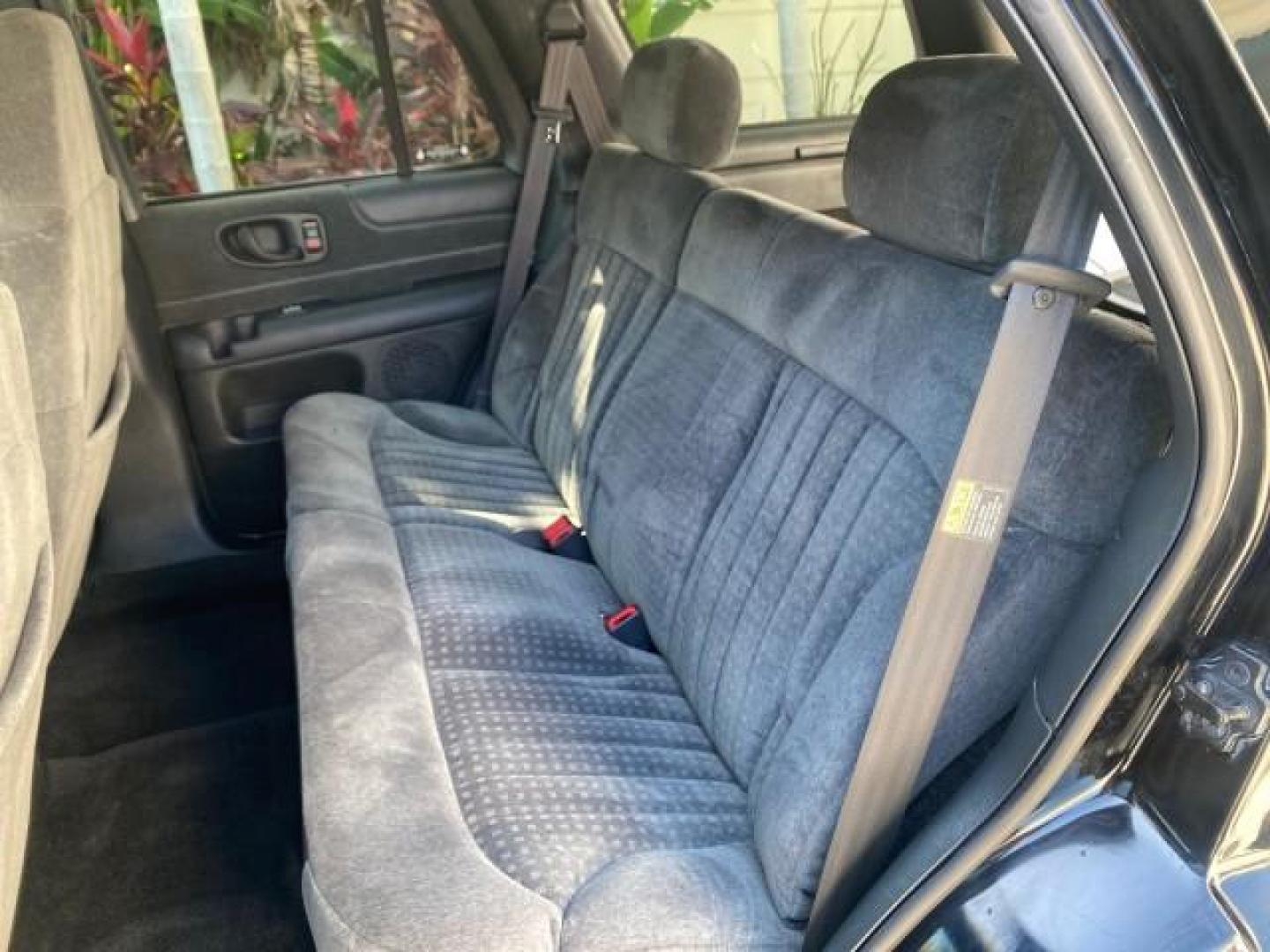 2002 Onyx Black /Medium Gray Chevrolet Blazer LS 4WD LOW MILES 35,402 (1GNDT13W62K) with an 4.3L Vortec 1000 SFI V6 Engine engine, Automatic transmission, located at 4701 North Dixie Hwy, Pompano Beach, FL, 33064, (954) 422-2889, 26.240938, -80.123474 - OUR WEBPAGE FLORIDACARS1.COM HAS OVER 100 PHOTOS AND FREE CARFAX LINK 2002 CHEVROLET BLAZER LS VIN: 1GNDT13W62K130832 1 G N D T 1 3 W 6 2 K 1 3 0 8 3 2 4 DOOR WAGON/SPORT UTILITY 4.3L V6 F OHV 12V GASOLINE REAR WHEEL DRIVE W/ 4X4 Top Features 4WD/AWD Cloth Seats Alloy Wheels Tow Hitch Basic Features - Photo#59