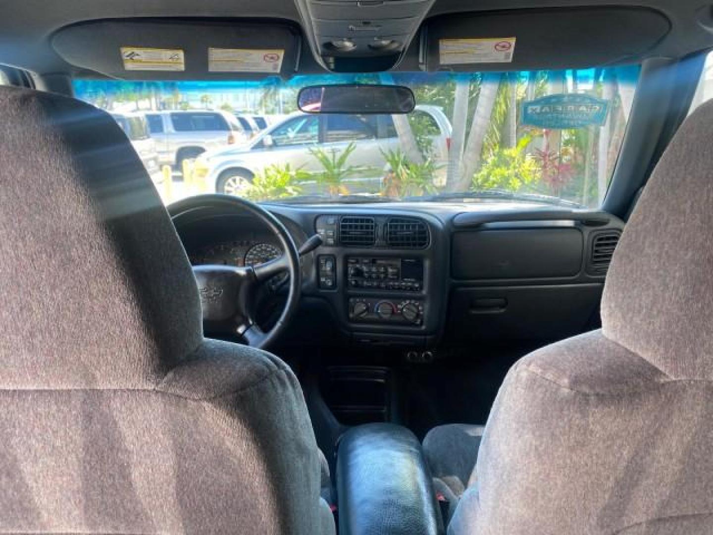 2002 Onyx Black /Medium Gray Chevrolet Blazer LS 4WD LOW MILES 35,402 (1GNDT13W62K) with an 4.3L Vortec 1000 SFI V6 Engine engine, Automatic transmission, located at 4701 North Dixie Hwy, Pompano Beach, FL, 33064, (954) 422-2889, 26.240938, -80.123474 - OUR WEBPAGE FLORIDACARS1.COM HAS OVER 100 PHOTOS AND FREE CARFAX LINK 2002 CHEVROLET BLAZER LS VIN: 1GNDT13W62K130832 1 G N D T 1 3 W 6 2 K 1 3 0 8 3 2 4 DOOR WAGON/SPORT UTILITY 4.3L V6 F OHV 12V GASOLINE REAR WHEEL DRIVE W/ 4X4 Top Features 4WD/AWD Cloth Seats Alloy Wheels Tow Hitch Basic Features - Photo#61