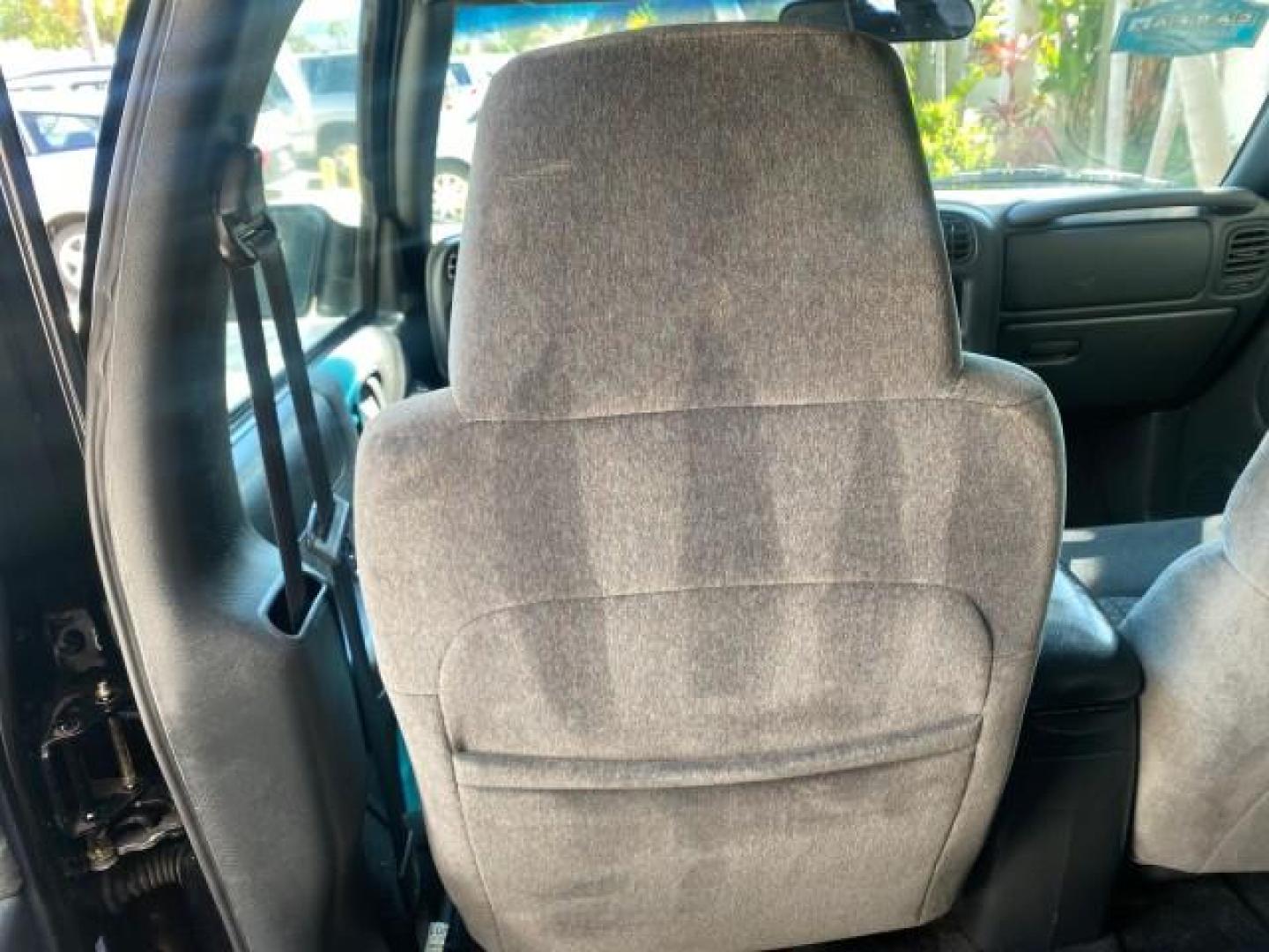 2002 Onyx Black /Medium Gray Chevrolet Blazer LS 4WD LOW MILES 35,402 (1GNDT13W62K) with an 4.3L Vortec 1000 SFI V6 Engine engine, Automatic transmission, located at 4701 North Dixie Hwy, Pompano Beach, FL, 33064, (954) 422-2889, 26.240938, -80.123474 - OUR WEBPAGE FLORIDACARS1.COM HAS OVER 100 PHOTOS AND FREE CARFAX LINK 2002 CHEVROLET BLAZER LS VIN: 1GNDT13W62K130832 1 G N D T 1 3 W 6 2 K 1 3 0 8 3 2 4 DOOR WAGON/SPORT UTILITY 4.3L V6 F OHV 12V GASOLINE REAR WHEEL DRIVE W/ 4X4 Top Features 4WD/AWD Cloth Seats Alloy Wheels Tow Hitch Basic Features - Photo#64