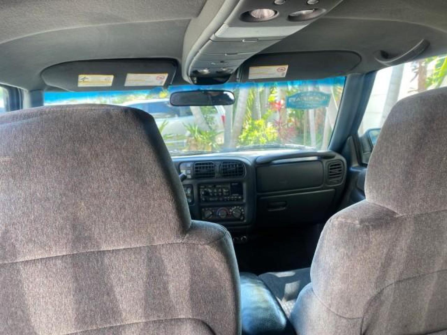 2002 Onyx Black /Medium Gray Chevrolet Blazer LS 4WD LOW MILES 35,402 (1GNDT13W62K) with an 4.3L Vortec 1000 SFI V6 Engine engine, Automatic transmission, located at 4701 North Dixie Hwy, Pompano Beach, FL, 33064, (954) 422-2889, 26.240938, -80.123474 - OUR WEBPAGE FLORIDACARS1.COM HAS OVER 100 PHOTOS AND FREE CARFAX LINK 2002 CHEVROLET BLAZER LS VIN: 1GNDT13W62K130832 1 G N D T 1 3 W 6 2 K 1 3 0 8 3 2 4 DOOR WAGON/SPORT UTILITY 4.3L V6 F OHV 12V GASOLINE REAR WHEEL DRIVE W/ 4X4 Top Features 4WD/AWD Cloth Seats Alloy Wheels Tow Hitch Basic Features - Photo#65
