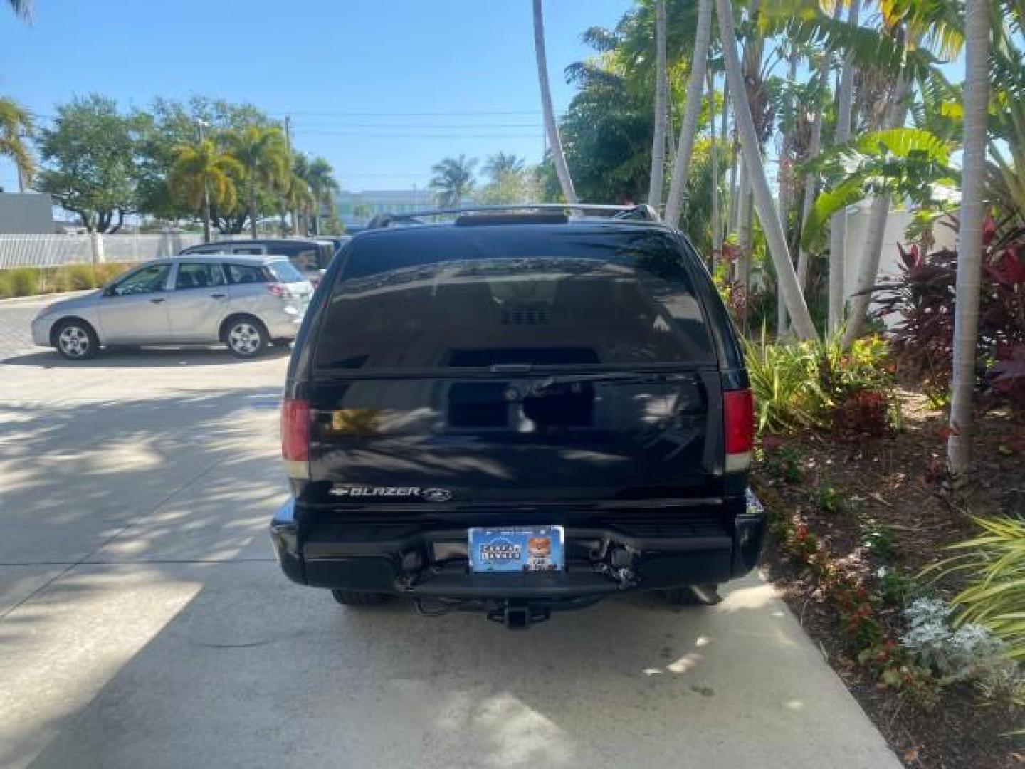 2002 Onyx Black /Medium Gray Chevrolet Blazer LS 4WD LOW MILES 35,402 (1GNDT13W62K) with an 4.3L Vortec 1000 SFI V6 Engine engine, Automatic transmission, located at 4701 North Dixie Hwy, Pompano Beach, FL, 33064, (954) 422-2889, 26.240938, -80.123474 - OUR WEBPAGE FLORIDACARS1.COM HAS OVER 100 PHOTOS AND FREE CARFAX LINK 2002 CHEVROLET BLAZER LS VIN: 1GNDT13W62K130832 1 G N D T 1 3 W 6 2 K 1 3 0 8 3 2 4 DOOR WAGON/SPORT UTILITY 4.3L V6 F OHV 12V GASOLINE REAR WHEEL DRIVE W/ 4X4 Top Features 4WD/AWD Cloth Seats Alloy Wheels Tow Hitch Basic Features - Photo#6