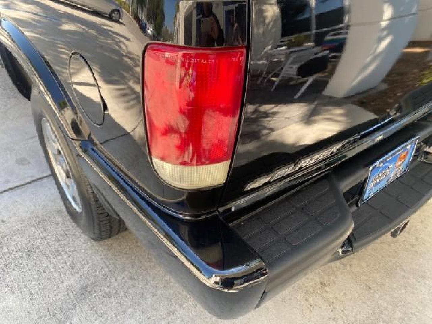 2002 Onyx Black /Medium Gray Chevrolet Blazer LS 4WD LOW MILES 35,402 (1GNDT13W62K) with an 4.3L Vortec 1000 SFI V6 Engine engine, Automatic transmission, located at 4701 North Dixie Hwy, Pompano Beach, FL, 33064, (954) 422-2889, 26.240938, -80.123474 - OUR WEBPAGE FLORIDACARS1.COM HAS OVER 100 PHOTOS AND FREE CARFAX LINK 2002 CHEVROLET BLAZER LS VIN: 1GNDT13W62K130832 1 G N D T 1 3 W 6 2 K 1 3 0 8 3 2 4 DOOR WAGON/SPORT UTILITY 4.3L V6 F OHV 12V GASOLINE REAR WHEEL DRIVE W/ 4X4 Top Features 4WD/AWD Cloth Seats Alloy Wheels Tow Hitch Basic Features - Photo#70