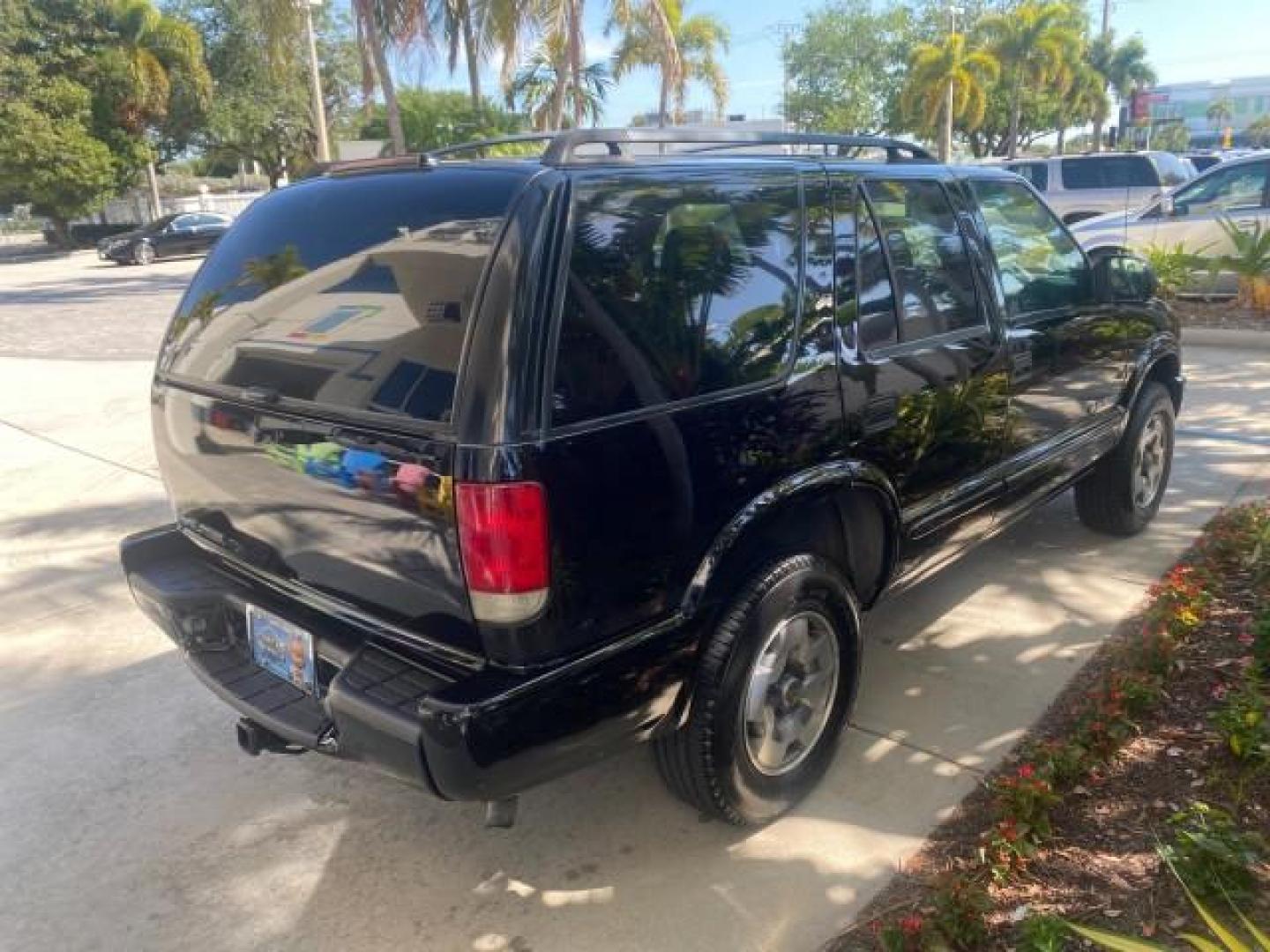 2002 Onyx Black /Medium Gray Chevrolet Blazer LS 4WD LOW MILES 35,402 (1GNDT13W62K) with an 4.3L Vortec 1000 SFI V6 Engine engine, Automatic transmission, located at 4701 North Dixie Hwy, Pompano Beach, FL, 33064, (954) 422-2889, 26.240938, -80.123474 - OUR WEBPAGE FLORIDACARS1.COM HAS OVER 100 PHOTOS AND FREE CARFAX LINK 2002 CHEVROLET BLAZER LS VIN: 1GNDT13W62K130832 1 G N D T 1 3 W 6 2 K 1 3 0 8 3 2 4 DOOR WAGON/SPORT UTILITY 4.3L V6 F OHV 12V GASOLINE REAR WHEEL DRIVE W/ 4X4 Top Features 4WD/AWD Cloth Seats Alloy Wheels Tow Hitch Basic Features - Photo#7