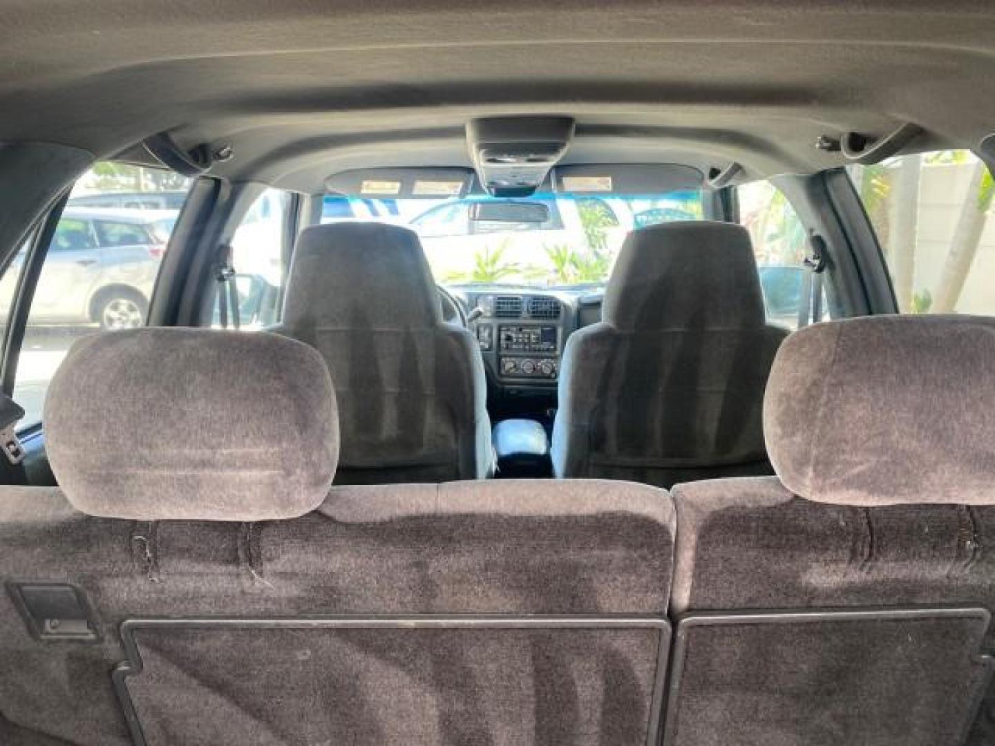 2002 Onyx Black /Medium Gray Chevrolet Blazer LS 4WD LOW MILES 35,402 (1GNDT13W62K) with an 4.3L Vortec 1000 SFI V6 Engine engine, Automatic transmission, located at 4701 North Dixie Hwy, Pompano Beach, FL, 33064, (954) 422-2889, 26.240938, -80.123474 - OUR WEBPAGE FLORIDACARS1.COM HAS OVER 100 PHOTOS AND FREE CARFAX LINK 2002 CHEVROLET BLAZER LS VIN: 1GNDT13W62K130832 1 G N D T 1 3 W 6 2 K 1 3 0 8 3 2 4 DOOR WAGON/SPORT UTILITY 4.3L V6 F OHV 12V GASOLINE REAR WHEEL DRIVE W/ 4X4 Top Features 4WD/AWD Cloth Seats Alloy Wheels Tow Hitch Basic Features - Photo#79