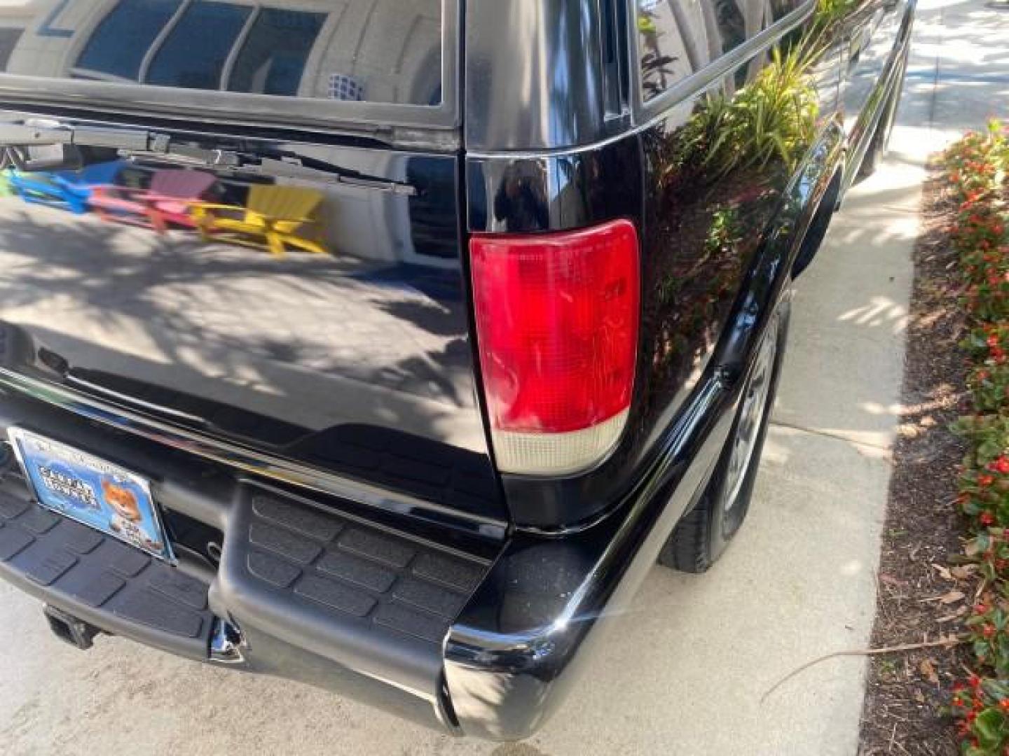 2002 Onyx Black /Medium Gray Chevrolet Blazer LS 4WD LOW MILES 35,402 (1GNDT13W62K) with an 4.3L Vortec 1000 SFI V6 Engine engine, Automatic transmission, located at 4701 North Dixie Hwy, Pompano Beach, FL, 33064, (954) 422-2889, 26.240938, -80.123474 - OUR WEBPAGE FLORIDACARS1.COM HAS OVER 100 PHOTOS AND FREE CARFAX LINK 2002 CHEVROLET BLAZER LS VIN: 1GNDT13W62K130832 1 G N D T 1 3 W 6 2 K 1 3 0 8 3 2 4 DOOR WAGON/SPORT UTILITY 4.3L V6 F OHV 12V GASOLINE REAR WHEEL DRIVE W/ 4X4 Top Features 4WD/AWD Cloth Seats Alloy Wheels Tow Hitch Basic Features - Photo#81