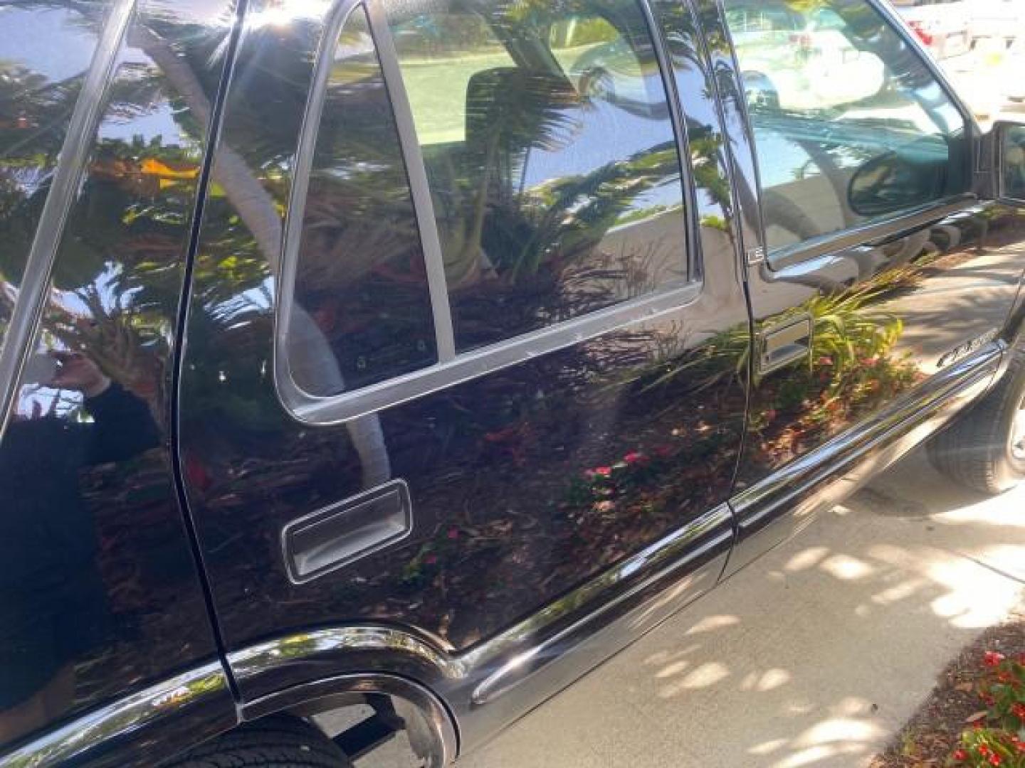 2002 Onyx Black /Medium Gray Chevrolet Blazer LS 4WD LOW MILES 35,402 (1GNDT13W62K) with an 4.3L Vortec 1000 SFI V6 Engine engine, Automatic transmission, located at 4701 North Dixie Hwy, Pompano Beach, FL, 33064, (954) 422-2889, 26.240938, -80.123474 - OUR WEBPAGE FLORIDACARS1.COM HAS OVER 100 PHOTOS AND FREE CARFAX LINK 2002 CHEVROLET BLAZER LS VIN: 1GNDT13W62K130832 1 G N D T 1 3 W 6 2 K 1 3 0 8 3 2 4 DOOR WAGON/SPORT UTILITY 4.3L V6 F OHV 12V GASOLINE REAR WHEEL DRIVE W/ 4X4 Top Features 4WD/AWD Cloth Seats Alloy Wheels Tow Hitch Basic Features - Photo#84