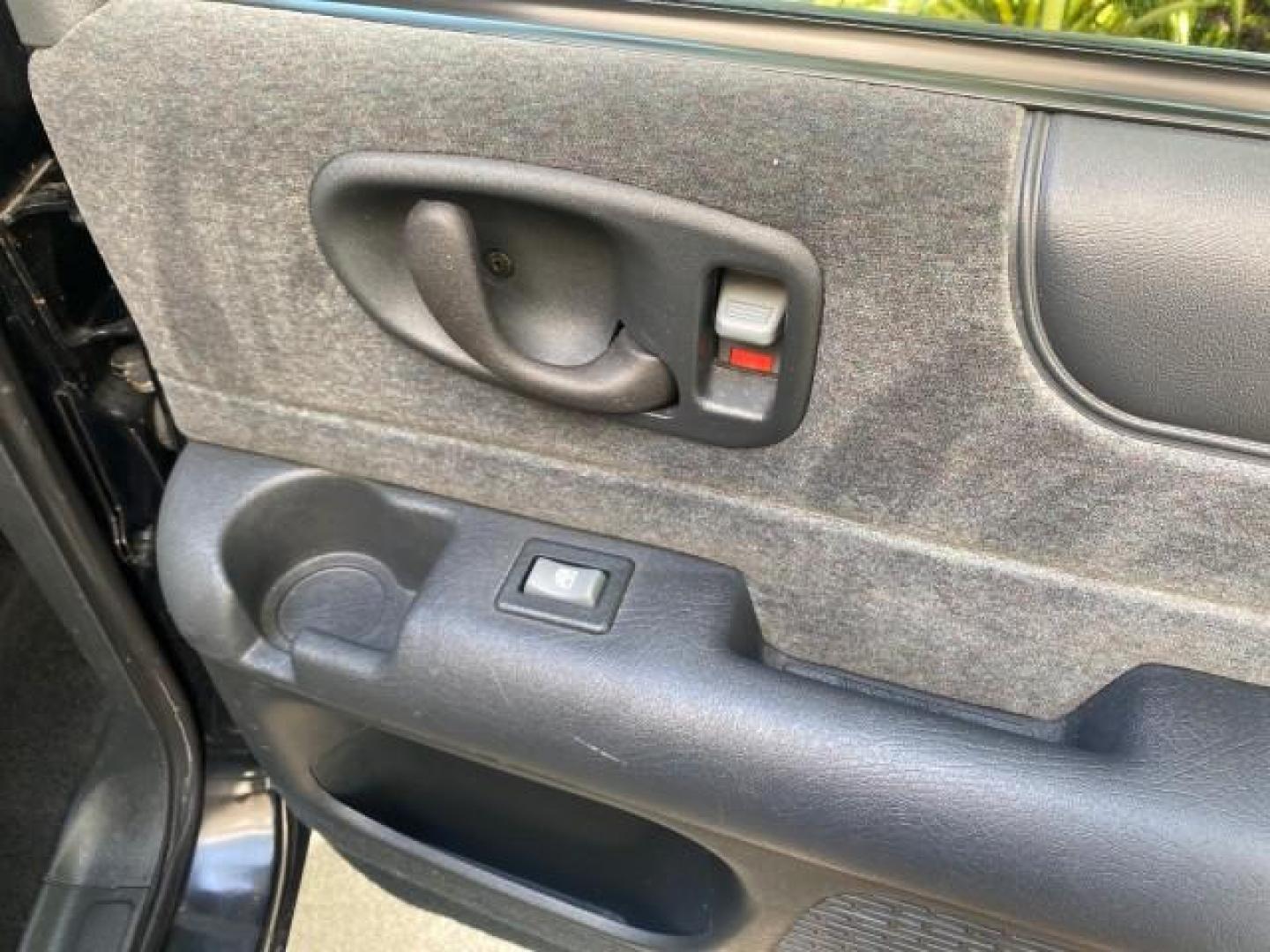 2002 Onyx Black /Medium Gray Chevrolet Blazer LS 4WD LOW MILES 35,402 (1GNDT13W62K) with an 4.3L Vortec 1000 SFI V6 Engine engine, Automatic transmission, located at 4701 North Dixie Hwy, Pompano Beach, FL, 33064, (954) 422-2889, 26.240938, -80.123474 - OUR WEBPAGE FLORIDACARS1.COM HAS OVER 100 PHOTOS AND FREE CARFAX LINK 2002 CHEVROLET BLAZER LS VIN: 1GNDT13W62K130832 1 G N D T 1 3 W 6 2 K 1 3 0 8 3 2 4 DOOR WAGON/SPORT UTILITY 4.3L V6 F OHV 12V GASOLINE REAR WHEEL DRIVE W/ 4X4 Top Features 4WD/AWD Cloth Seats Alloy Wheels Tow Hitch Basic Features - Photo#86