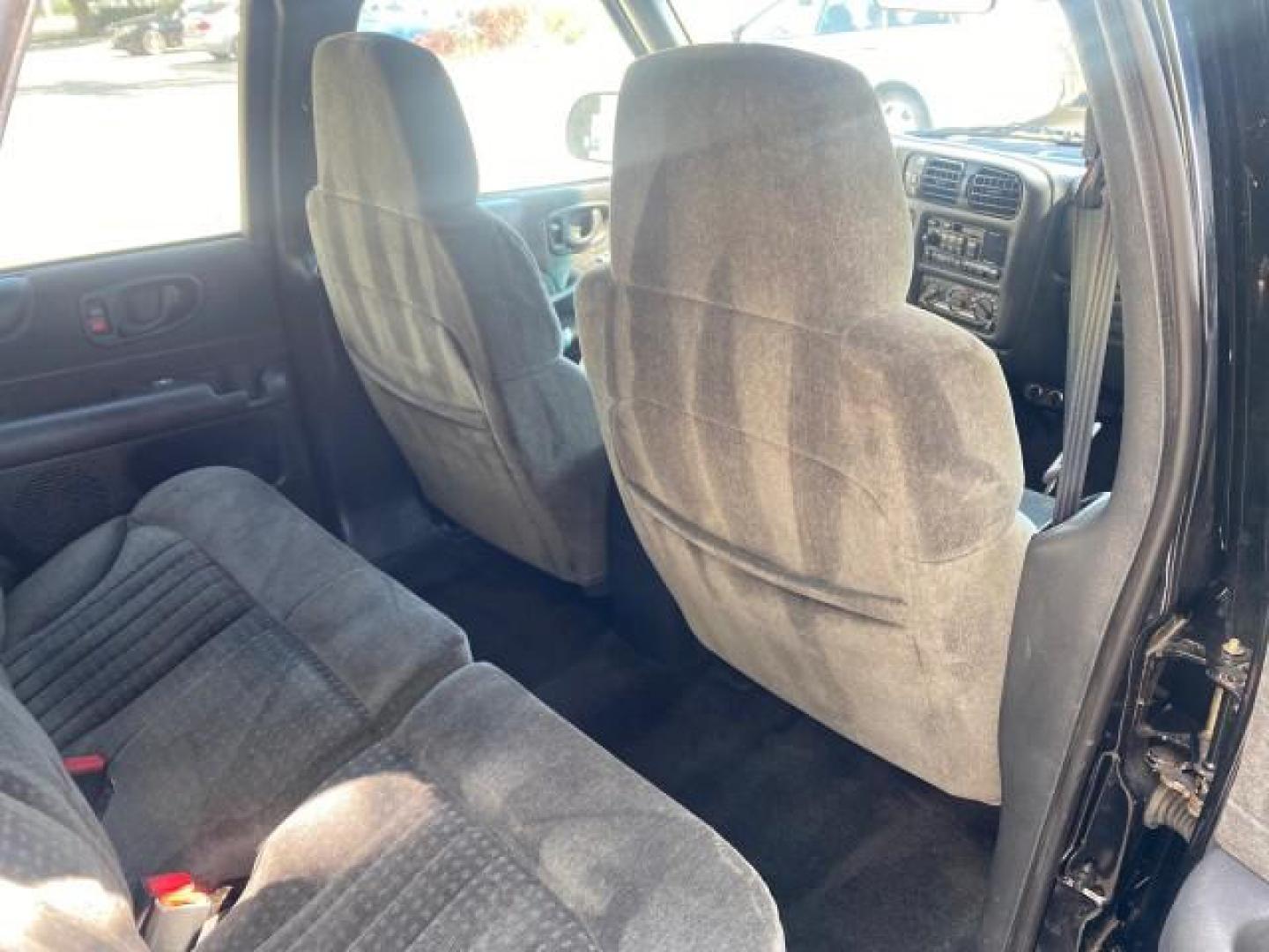 2002 Onyx Black /Medium Gray Chevrolet Blazer LS 4WD LOW MILES 35,402 (1GNDT13W62K) with an 4.3L Vortec 1000 SFI V6 Engine engine, Automatic transmission, located at 4701 North Dixie Hwy, Pompano Beach, FL, 33064, (954) 422-2889, 26.240938, -80.123474 - OUR WEBPAGE FLORIDACARS1.COM HAS OVER 100 PHOTOS AND FREE CARFAX LINK 2002 CHEVROLET BLAZER LS VIN: 1GNDT13W62K130832 1 G N D T 1 3 W 6 2 K 1 3 0 8 3 2 4 DOOR WAGON/SPORT UTILITY 4.3L V6 F OHV 12V GASOLINE REAR WHEEL DRIVE W/ 4X4 Top Features 4WD/AWD Cloth Seats Alloy Wheels Tow Hitch Basic Features - Photo#87