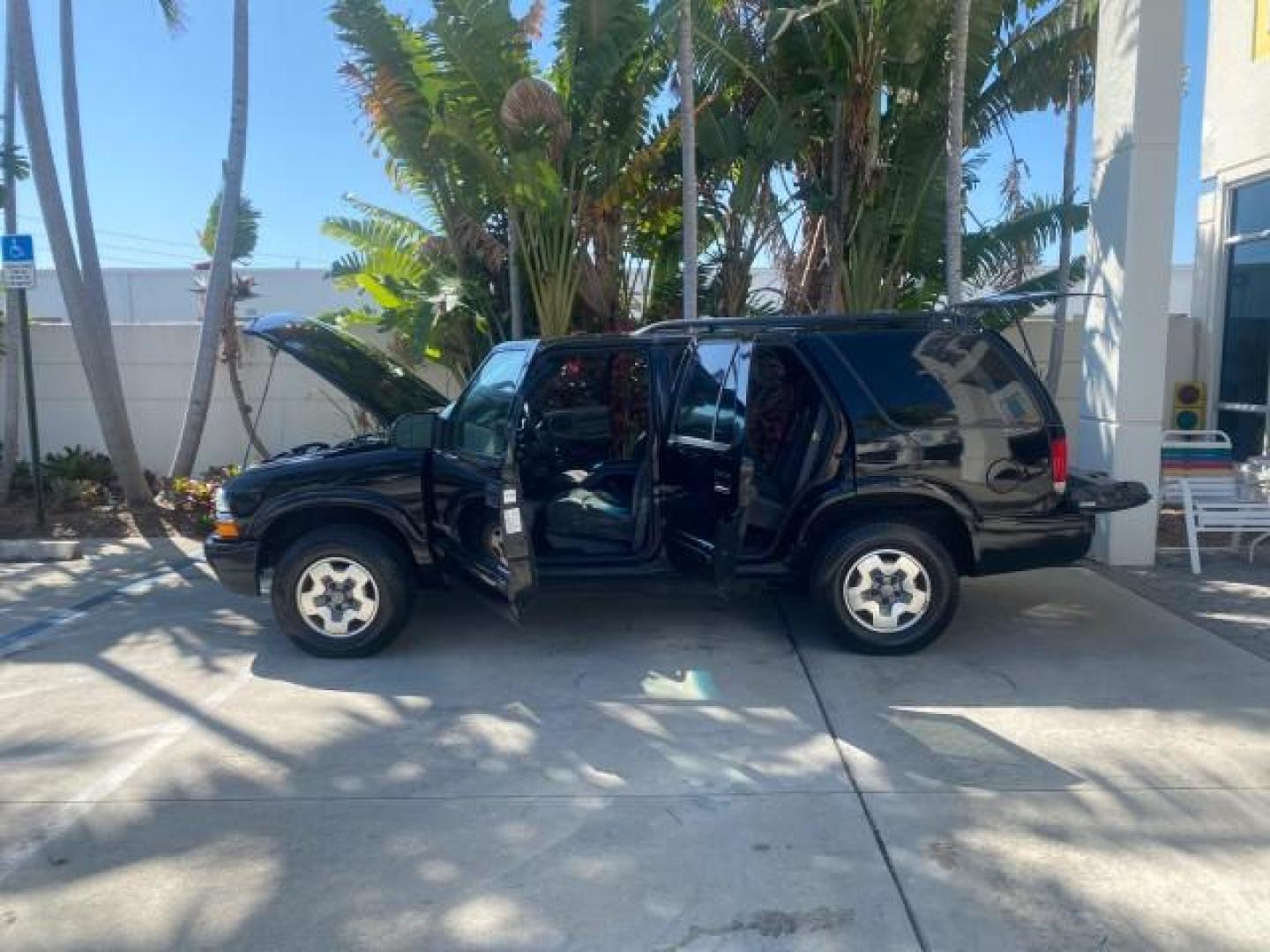 2002 Onyx Black /Medium Gray Chevrolet Blazer LS 4WD LOW MILES 35,402 (1GNDT13W62K) with an 4.3L Vortec 1000 SFI V6 Engine engine, Automatic transmission, located at 4701 North Dixie Hwy, Pompano Beach, FL, 33064, (954) 422-2889, 26.240938, -80.123474 - OUR WEBPAGE FLORIDACARS1.COM HAS OVER 100 PHOTOS AND FREE CARFAX LINK 2002 CHEVROLET BLAZER LS VIN: 1GNDT13W62K130832 1 G N D T 1 3 W 6 2 K 1 3 0 8 3 2 4 DOOR WAGON/SPORT UTILITY 4.3L V6 F OHV 12V GASOLINE REAR WHEEL DRIVE W/ 4X4 Top Features 4WD/AWD Cloth Seats Alloy Wheels Tow Hitch Basic Features - Photo#8