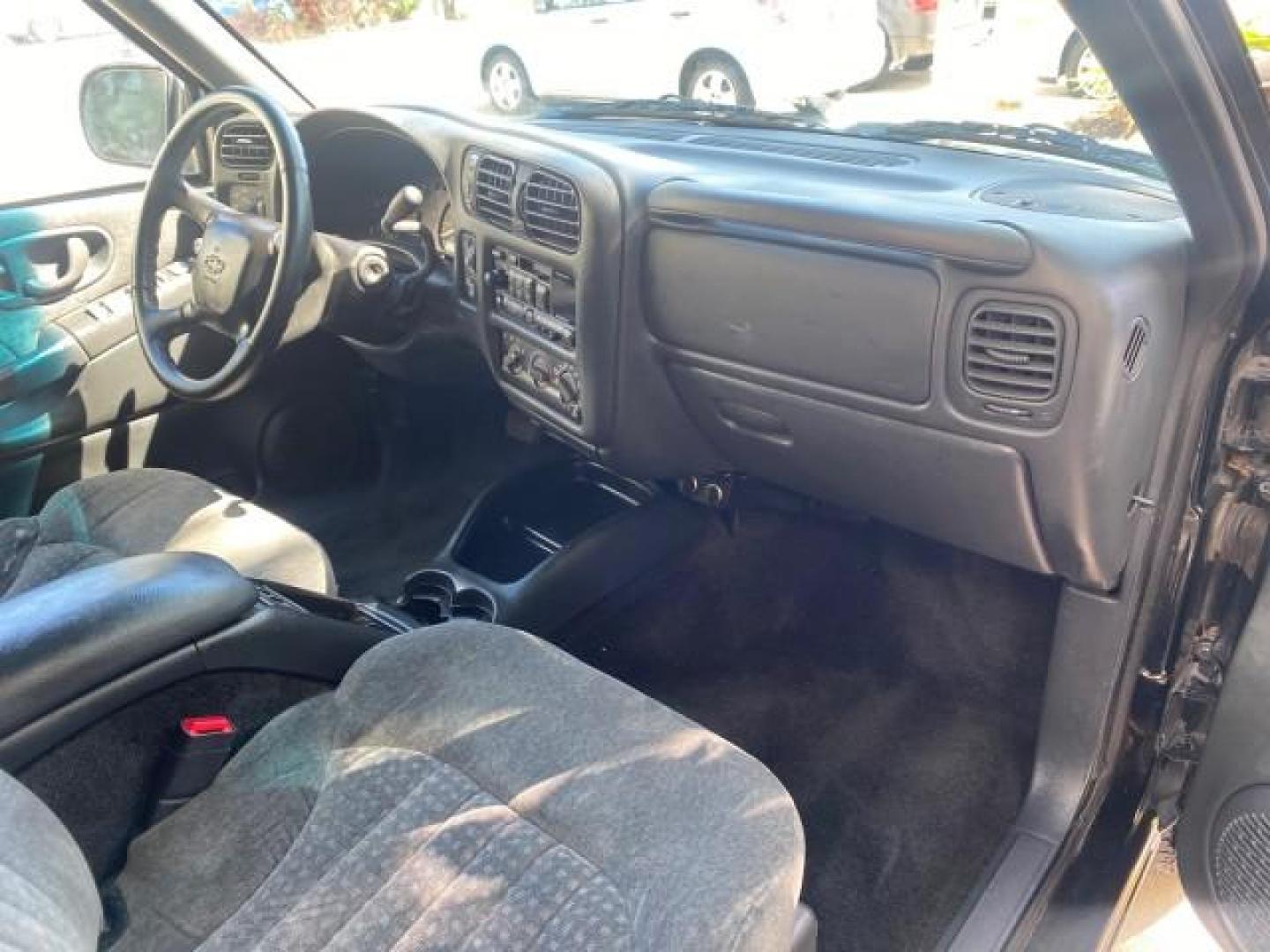 2002 Onyx Black /Medium Gray Chevrolet Blazer LS 4WD LOW MILES 35,402 (1GNDT13W62K) with an 4.3L Vortec 1000 SFI V6 Engine engine, Automatic transmission, located at 4701 North Dixie Hwy, Pompano Beach, FL, 33064, (954) 422-2889, 26.240938, -80.123474 - OUR WEBPAGE FLORIDACARS1.COM HAS OVER 100 PHOTOS AND FREE CARFAX LINK 2002 CHEVROLET BLAZER LS VIN: 1GNDT13W62K130832 1 G N D T 1 3 W 6 2 K 1 3 0 8 3 2 4 DOOR WAGON/SPORT UTILITY 4.3L V6 F OHV 12V GASOLINE REAR WHEEL DRIVE W/ 4X4 Top Features 4WD/AWD Cloth Seats Alloy Wheels Tow Hitch Basic Features - Photo#94