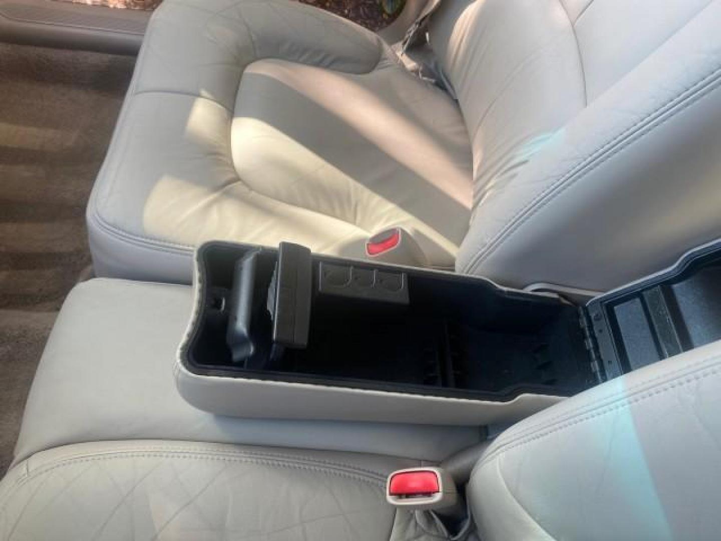 2001 White /Shale Buick Park Avenue LOW MILES 40,143 SUNROOF PEARL (1G4CW54K114) with an 3.8L SFI V6 3800 Series II Engine engine, Automatic transmission, located at 4701 North Dixie Hwy, Pompano Beach, FL, 33064, (954) 422-2889, 26.240938, -80.123474 - OUR WEBPAGE FLORIDACARS1.COM HAS OVER 100 PHOTOS AND FREE CARFAX LINK 2001 BUICK PARK AVENUE HARD TO FIND ! VIN: 1G4CW54K114283664 1 G 4 C W 5 4 K 1 1 4 2 8 3 6 6 4 SEDAN 4 DR 3.8L V6 F 12V GASOLINE 30 MPG FRONT WHEEL DRIVE Top Features Alloy Wheels Leather Seats Basic Features ABS Brakes Automatic - Photo#56