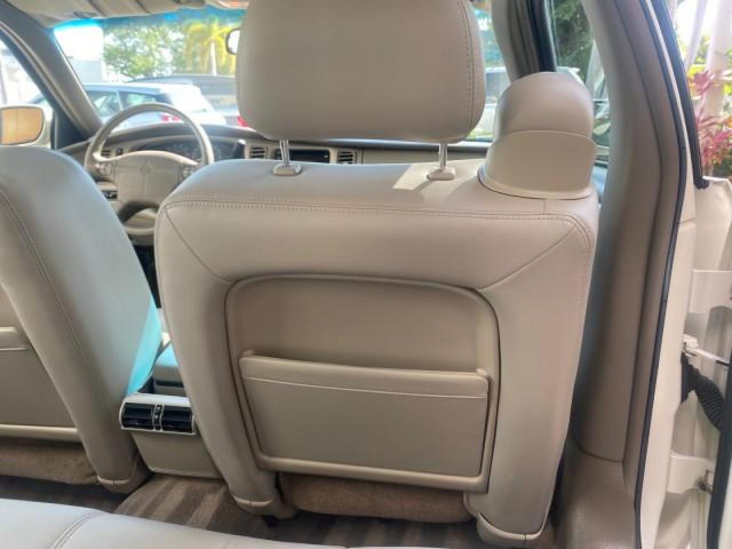 2001 White /Shale Buick Park Avenue LOW MILES 40,143 SUNROOF PEARL (1G4CW54K114) with an 3.8L SFI V6 3800 Series II Engine engine, Automatic transmission, located at 4701 North Dixie Hwy, Pompano Beach, FL, 33064, (954) 422-2889, 26.240938, -80.123474 - OUR WEBPAGE FLORIDACARS1.COM HAS OVER 100 PHOTOS AND FREE CARFAX LINK 2001 BUICK PARK AVENUE HARD TO FIND ! VIN: 1G4CW54K114283664 1 G 4 C W 5 4 K 1 1 4 2 8 3 6 6 4 SEDAN 4 DR 3.8L V6 F 12V GASOLINE 30 MPG FRONT WHEEL DRIVE Top Features Alloy Wheels Leather Seats Basic Features ABS Brakes Automatic - Photo#92