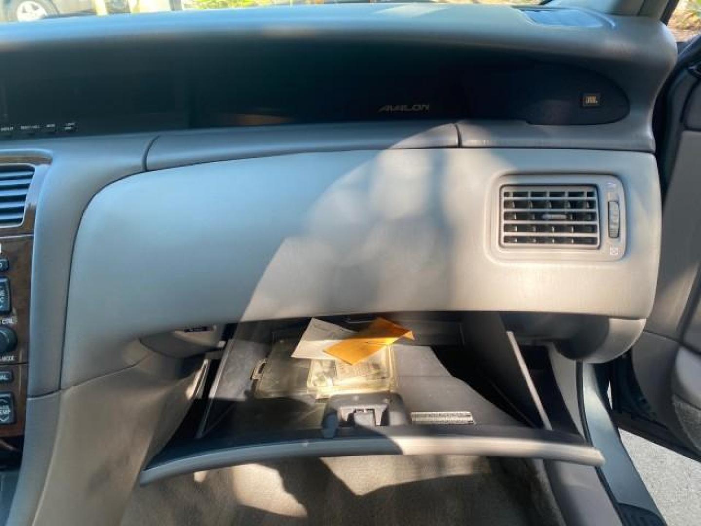 2004 Phantom Gray Pearl /Stone Toyota Avalon XLS LEATHER LOW MILES 60,653 4 BRAND NEW TIRES (4T1BF28B74U) with an 3.0L DOHC MPFI 24-Valve V6 Engine engine, Automatic transmission, located at 4701 North Dixie Hwy, Pompano Beach, FL, 33064, (954) 422-2889, 26.240938, -80.123474 - OUR WEBPAGE FLORIDACARS1.COM HAS OVER 100 PHOTOS AND FREE CARFAX LINK 2004 TOYOTA AVALON XLS NO RECALLS VIN: 4T1BF28B74U353130 4 T 1 B F 2 8 B 7 4 U 3 5 3 1 3 0 SEDAN 4 DR 3.0L V6 F DOHC 24V 29 MPG GASOLINE FRONT WHEEL DRIVE SUNROOF Top Features Alloy Wheels Luxury Package Front Seat Heaters Memory - Photo#99