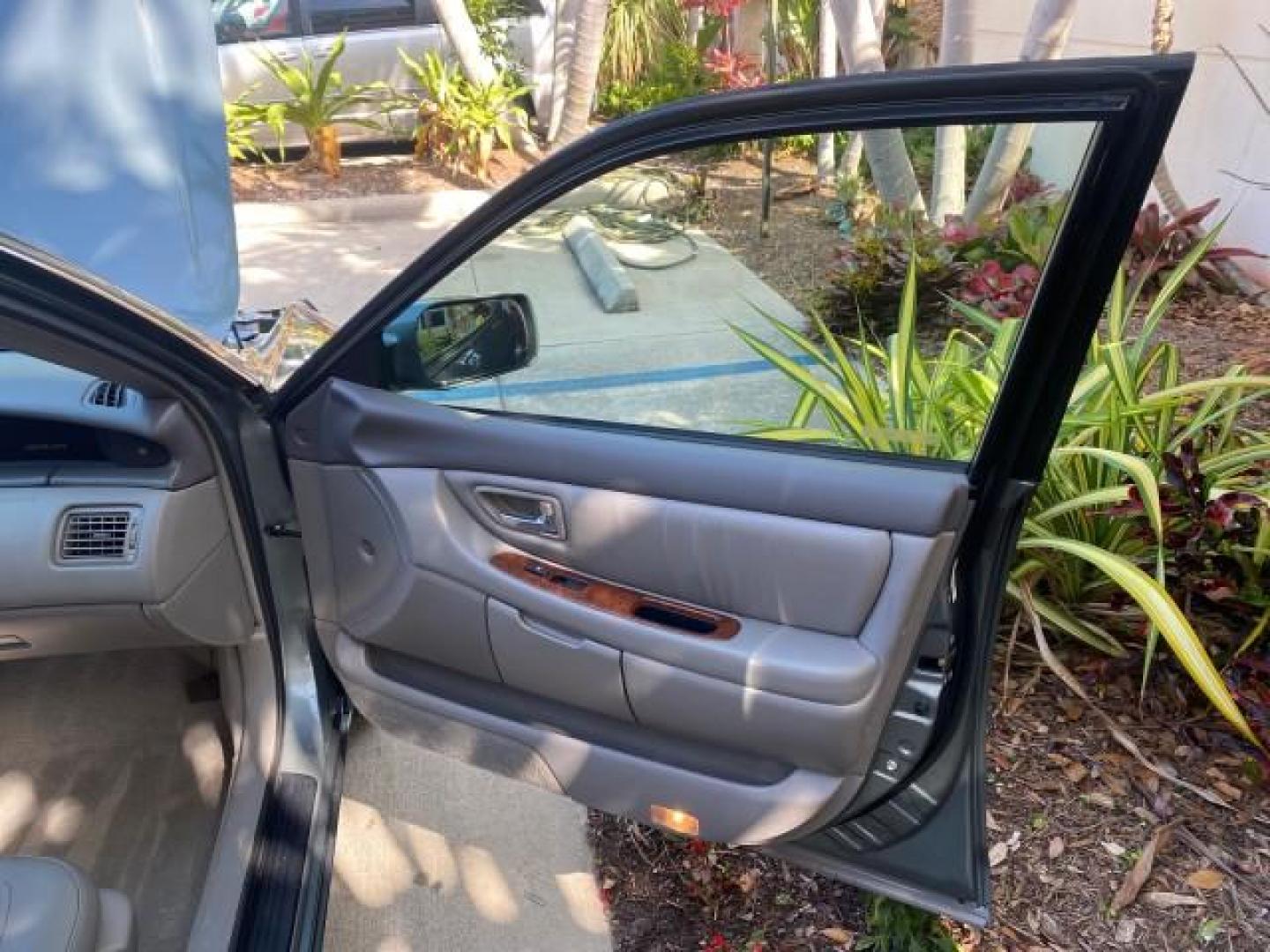 2004 Phantom Gray Pearl /Stone Toyota Avalon XLS LEATHER LOW MILES 60,653 4 BRAND NEW TIRES (4T1BF28B74U) with an 3.0L DOHC MPFI 24-Valve V6 Engine engine, Automatic transmission, located at 4701 North Dixie Hwy, Pompano Beach, FL, 33064, (954) 422-2889, 26.240938, -80.123474 - OUR WEBPAGE FLORIDACARS1.COM HAS OVER 100 PHOTOS AND FREE CARFAX LINK 2004 TOYOTA AVALON XLS NO RECALLS VIN: 4T1BF28B74U353130 4 T 1 B F 2 8 B 7 4 U 3 5 3 1 3 0 SEDAN 4 DR 3.0L V6 F DOHC 24V 29 MPG GASOLINE FRONT WHEEL DRIVE SUNROOF Top Features Alloy Wheels Luxury Package Front Seat Heaters Memory - Photo#11