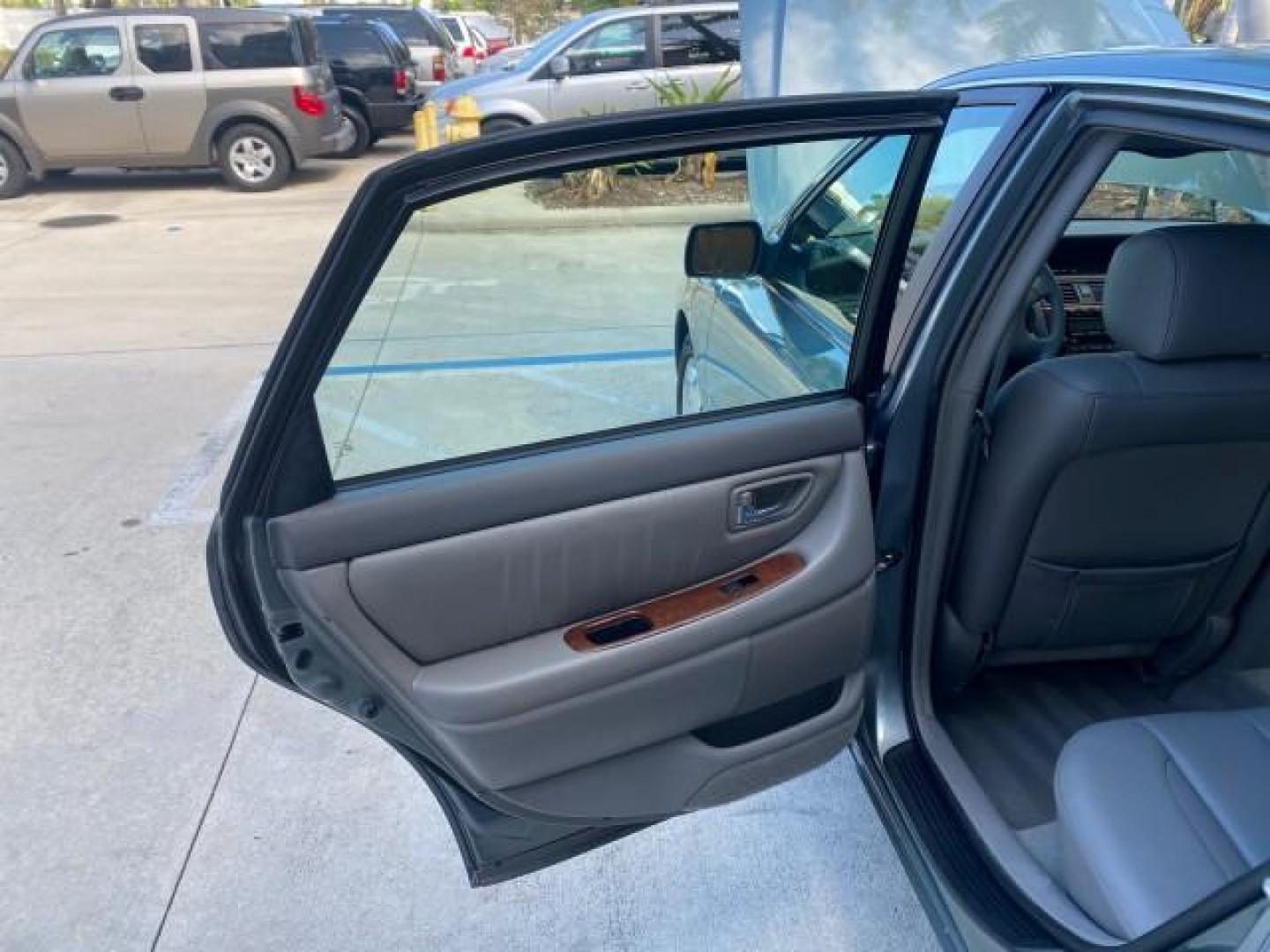 2004 Phantom Gray Pearl /Stone Toyota Avalon XLS LEATHER LOW MILES 60,653 4 BRAND NEW TIRES (4T1BF28B74U) with an 3.0L DOHC MPFI 24-Valve V6 Engine engine, Automatic transmission, located at 4701 North Dixie Hwy, Pompano Beach, FL, 33064, (954) 422-2889, 26.240938, -80.123474 - OUR WEBPAGE FLORIDACARS1.COM HAS OVER 100 PHOTOS AND FREE CARFAX LINK 2004 TOYOTA AVALON XLS NO RECALLS VIN: 4T1BF28B74U353130 4 T 1 B F 2 8 B 7 4 U 3 5 3 1 3 0 SEDAN 4 DR 3.0L V6 F DOHC 24V 29 MPG GASOLINE FRONT WHEEL DRIVE SUNROOF Top Features Alloy Wheels Luxury Package Front Seat Heaters Memory - Photo#13