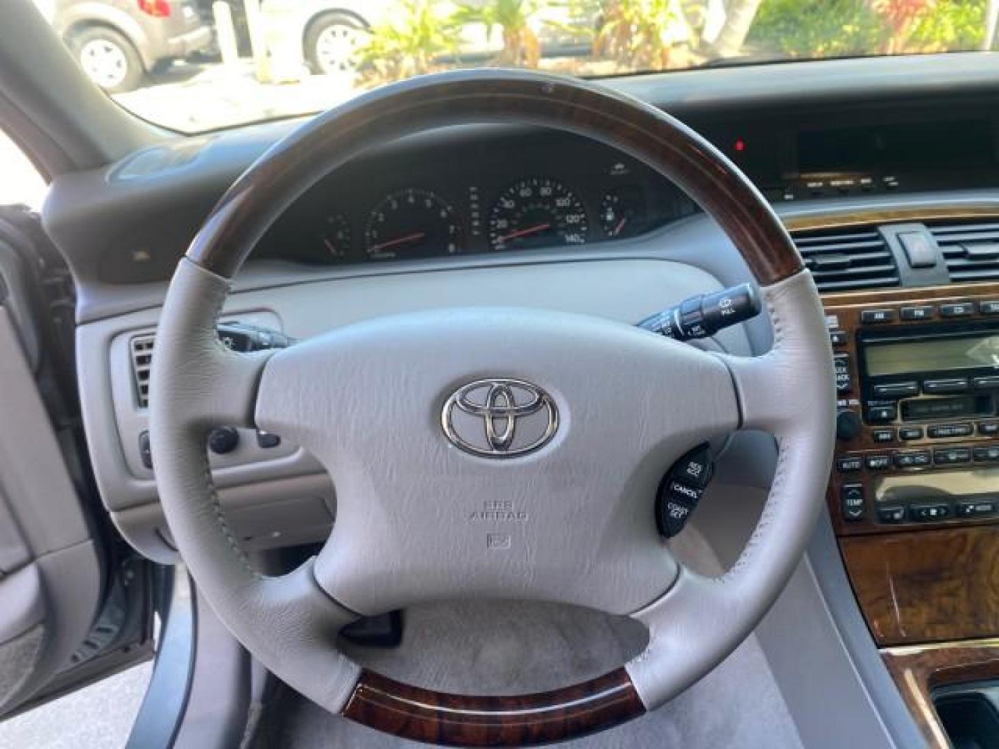 2004 Phantom Gray Pearl /Stone Toyota Avalon XLS LEATHER LOW MILES 60,653 4 BRAND NEW TIRES (4T1BF28B74U) with an 3.0L DOHC MPFI 24-Valve V6 Engine engine, Automatic transmission, located at 4701 North Dixie Hwy, Pompano Beach, FL, 33064, (954) 422-2889, 26.240938, -80.123474 - OUR WEBPAGE FLORIDACARS1.COM HAS OVER 100 PHOTOS AND FREE CARFAX LINK 2004 TOYOTA AVALON XLS NO RECALLS VIN: 4T1BF28B74U353130 4 T 1 B F 2 8 B 7 4 U 3 5 3 1 3 0 SEDAN 4 DR 3.0L V6 F DOHC 24V 29 MPG GASOLINE FRONT WHEEL DRIVE SUNROOF Top Features Alloy Wheels Luxury Package Front Seat Heaters Memory - Photo#31