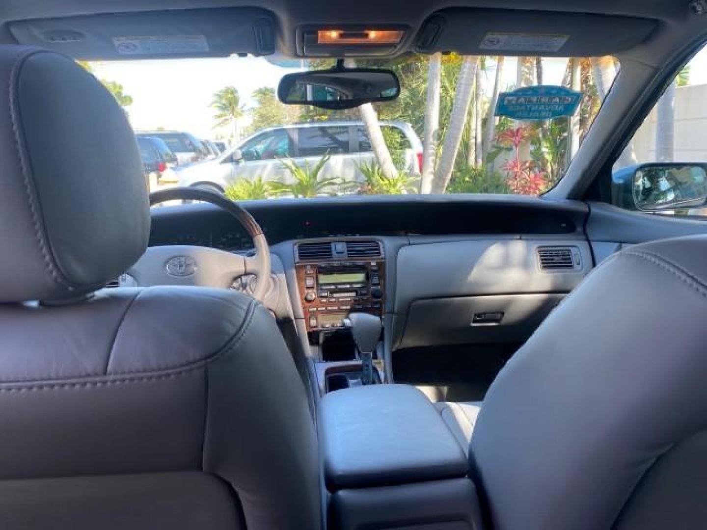 2004 Phantom Gray Pearl /Stone Toyota Avalon XLS LEATHER LOW MILES 60,653 4 BRAND NEW TIRES (4T1BF28B74U) with an 3.0L DOHC MPFI 24-Valve V6 Engine engine, Automatic transmission, located at 4701 North Dixie Hwy, Pompano Beach, FL, 33064, (954) 422-2889, 26.240938, -80.123474 - OUR WEBPAGE FLORIDACARS1.COM HAS OVER 100 PHOTOS AND FREE CARFAX LINK 2004 TOYOTA AVALON XLS NO RECALLS VIN: 4T1BF28B74U353130 4 T 1 B F 2 8 B 7 4 U 3 5 3 1 3 0 SEDAN 4 DR 3.0L V6 F DOHC 24V 29 MPG GASOLINE FRONT WHEEL DRIVE SUNROOF Top Features Alloy Wheels Luxury Package Front Seat Heaters Memory - Photo#65