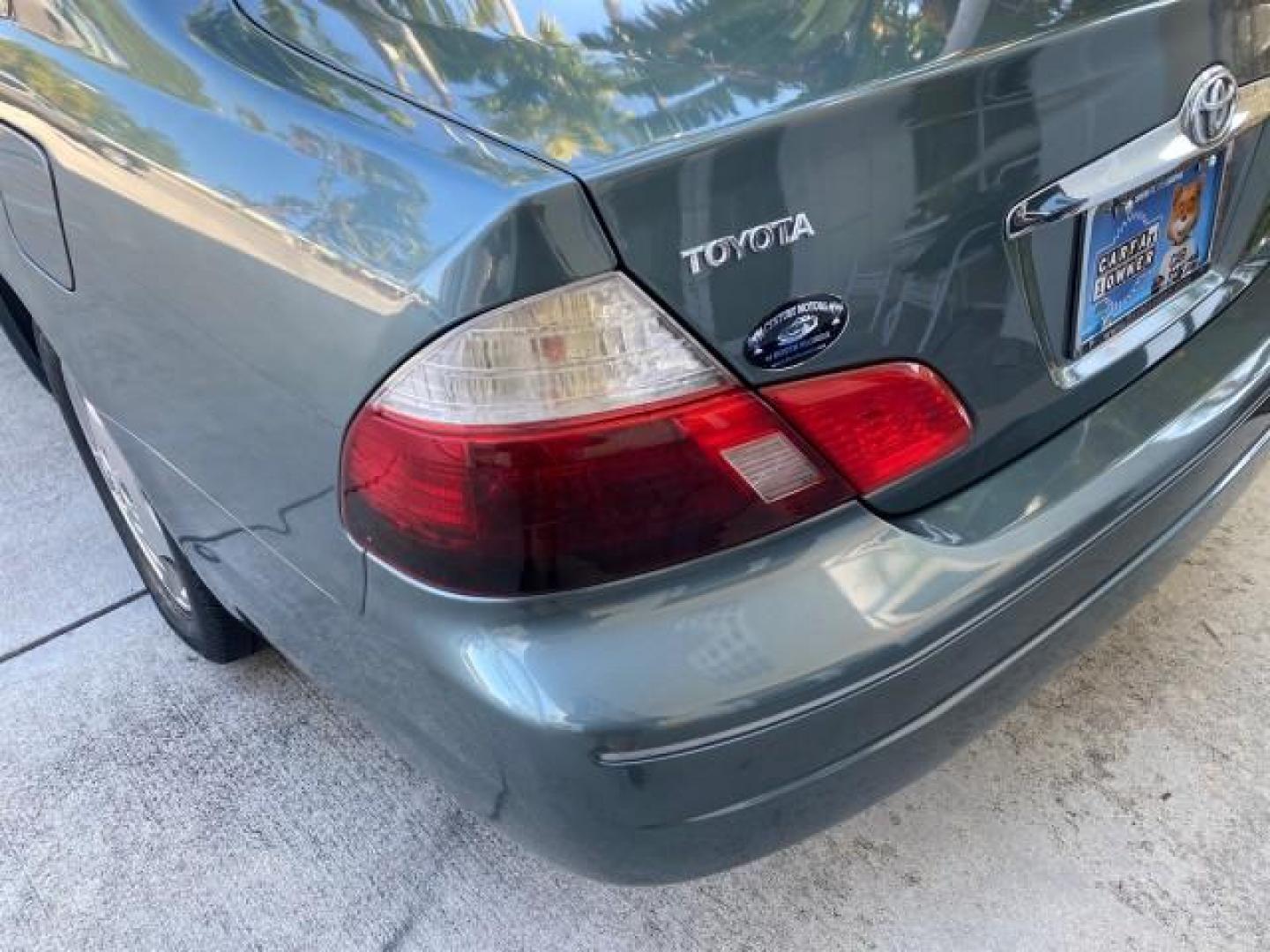 2004 Phantom Gray Pearl /Stone Toyota Avalon XLS LEATHER LOW MILES 60,653 4 BRAND NEW TIRES (4T1BF28B74U) with an 3.0L DOHC MPFI 24-Valve V6 Engine engine, Automatic transmission, located at 4701 North Dixie Hwy, Pompano Beach, FL, 33064, (954) 422-2889, 26.240938, -80.123474 - OUR WEBPAGE FLORIDACARS1.COM HAS OVER 100 PHOTOS AND FREE CARFAX LINK 2004 TOYOTA AVALON XLS NO RECALLS VIN: 4T1BF28B74U353130 4 T 1 B F 2 8 B 7 4 U 3 5 3 1 3 0 SEDAN 4 DR 3.0L V6 F DOHC 24V 29 MPG GASOLINE FRONT WHEEL DRIVE SUNROOF Top Features Alloy Wheels Luxury Package Front Seat Heaters Memory - Photo#74