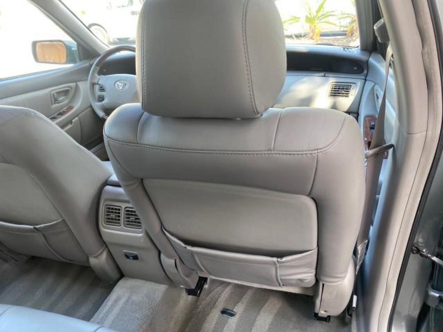 2004 Phantom Gray Pearl /Stone Toyota Avalon XLS LEATHER LOW MILES 60,653 4 BRAND NEW TIRES (4T1BF28B74U) with an 3.0L DOHC MPFI 24-Valve V6 Engine engine, Automatic transmission, located at 4701 North Dixie Hwy, Pompano Beach, FL, 33064, (954) 422-2889, 26.240938, -80.123474 - OUR WEBPAGE FLORIDACARS1.COM HAS OVER 100 PHOTOS AND FREE CARFAX LINK 2004 TOYOTA AVALON XLS NO RECALLS VIN: 4T1BF28B74U353130 4 T 1 B F 2 8 B 7 4 U 3 5 3 1 3 0 SEDAN 4 DR 3.0L V6 F DOHC 24V 29 MPG GASOLINE FRONT WHEEL DRIVE SUNROOF Top Features Alloy Wheels Luxury Package Front Seat Heaters Memory - Photo#91