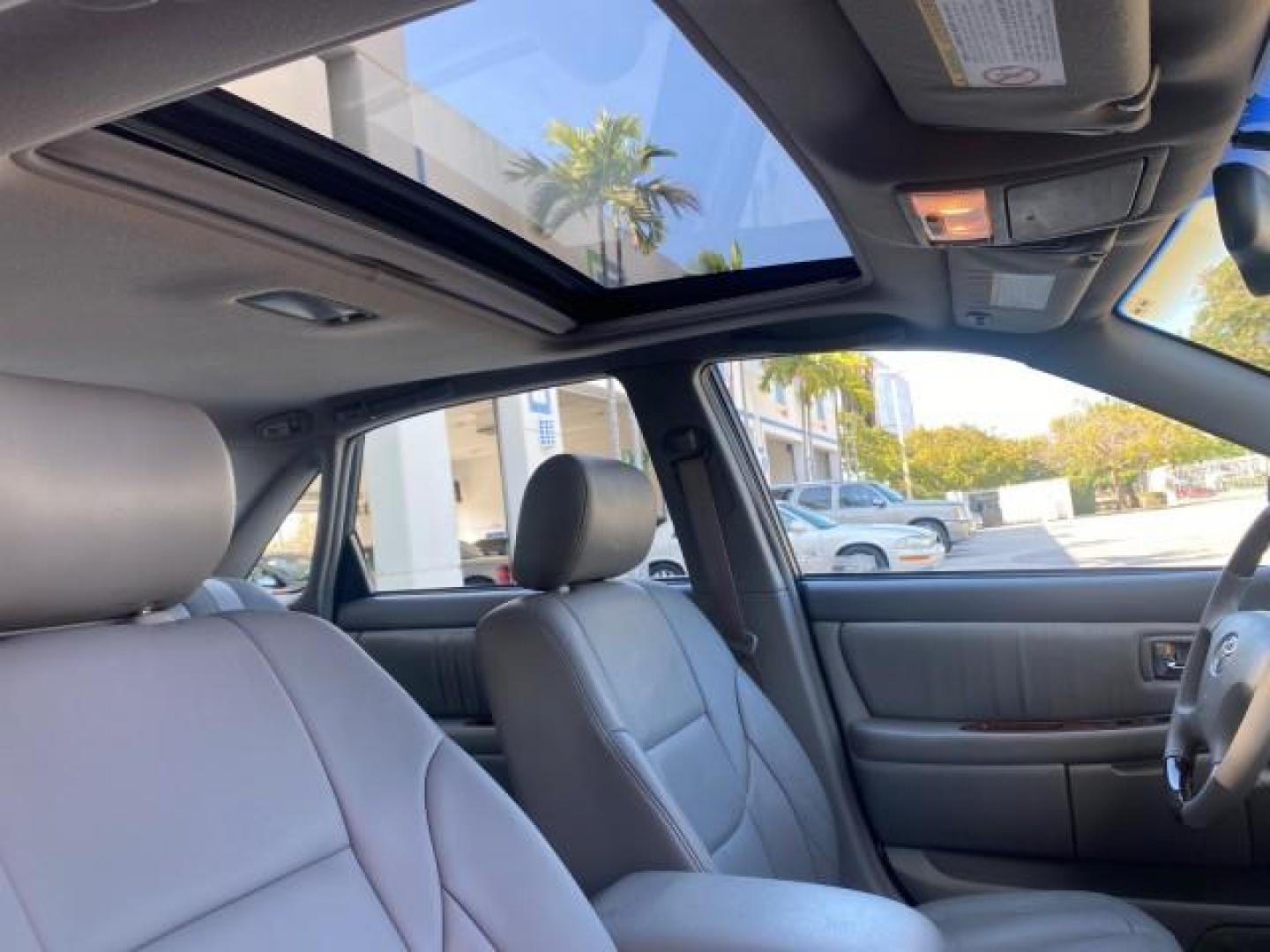 2004 Phantom Gray Pearl /Stone Toyota Avalon XLS LEATHER LOW MILES 60,653 4 BRAND NEW TIRES (4T1BF28B74U) with an 3.0L DOHC MPFI 24-Valve V6 Engine engine, Automatic transmission, located at 4701 North Dixie Hwy, Pompano Beach, FL, 33064, (954) 422-2889, 26.240938, -80.123474 - OUR WEBPAGE FLORIDACARS1.COM HAS OVER 100 PHOTOS AND FREE CARFAX LINK 2004 TOYOTA AVALON XLS NO RECALLS VIN: 4T1BF28B74U353130 4 T 1 B F 2 8 B 7 4 U 3 5 3 1 3 0 SEDAN 4 DR 3.0L V6 F DOHC 24V 29 MPG GASOLINE FRONT WHEEL DRIVE SUNROOF Top Features Alloy Wheels Luxury Package Front Seat Heaters Memory - Photo#96