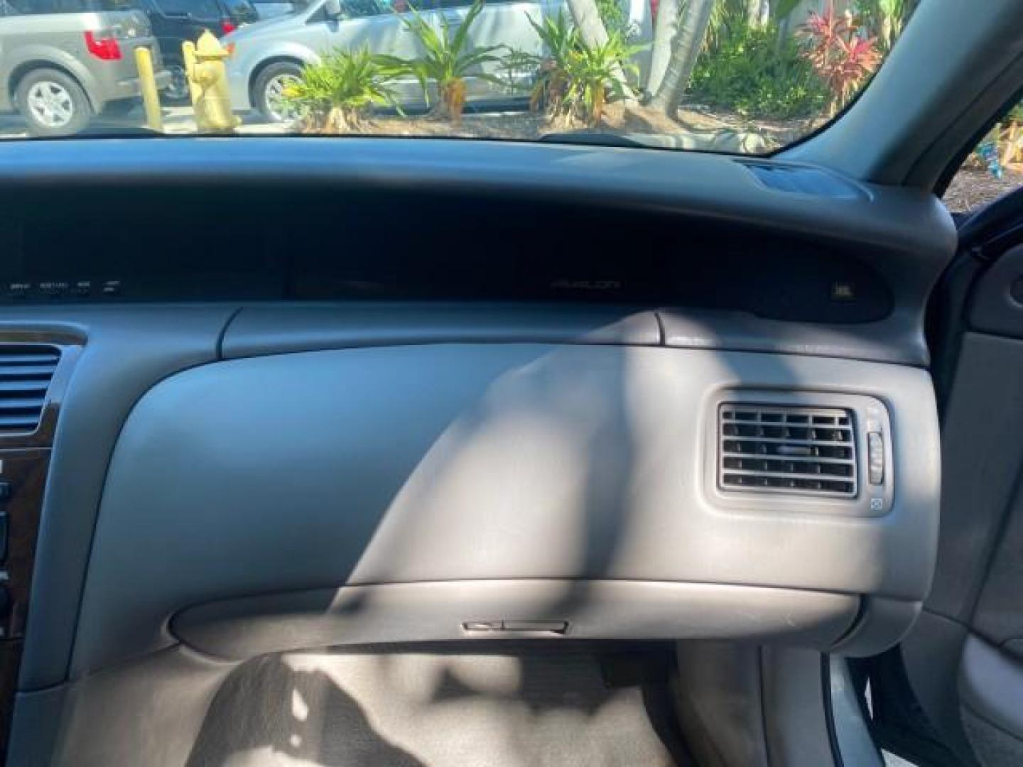 2004 Phantom Gray Pearl /Stone Toyota Avalon XLS LEATHER LOW MILES 60,653 4 BRAND NEW TIRES (4T1BF28B74U) with an 3.0L DOHC MPFI 24-Valve V6 Engine engine, Automatic transmission, located at 4701 North Dixie Hwy, Pompano Beach, FL, 33064, (954) 422-2889, 26.240938, -80.123474 - OUR WEBPAGE FLORIDACARS1.COM HAS OVER 100 PHOTOS AND FREE CARFAX LINK 2004 TOYOTA AVALON XLS NO RECALLS VIN: 4T1BF28B74U353130 4 T 1 B F 2 8 B 7 4 U 3 5 3 1 3 0 SEDAN 4 DR 3.0L V6 F DOHC 24V 29 MPG GASOLINE FRONT WHEEL DRIVE SUNROOF Top Features Alloy Wheels Luxury Package Front Seat Heaters Memory - Photo#98