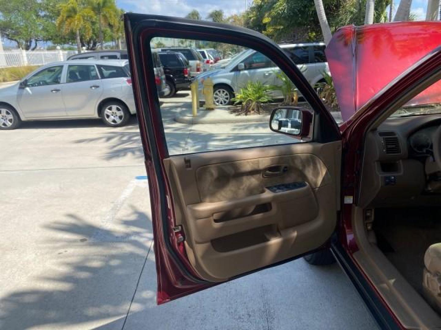 2004 Chianti Red Pearl /Saddle Honda CR-V EX AWD 1 OWNER LOW MILES 72,136 (JHLRD78804C) with an 2.4L DOHC PGM-FI 16-Valve i-VTEC I4 Engine engine, Automatic transmission, located at 4701 North Dixie Hwy, Pompano Beach, FL, 33064, (954) 422-2889, 26.240938, -80.123474 - OUR WEBPAGE FLORIDACARS1.COM HAS OVER 100 PHOTOS AND FREE CARFAX LINK 2004 HONDA CR-V EX VIN: JHLRD78804C043839 J H L R D 7 8 8 0 4 C 0 4 3 8 3 9 4 DOOR WAGON/SPORT UTILITY 2.4L I4 F DOHC GASOLINE ALL WHEEL DRIVE NO RECALLS Top Features 4WD/AWD Leatherette and Cloth Alloy Wheels Sunroof(s) Basic F - Photo#9