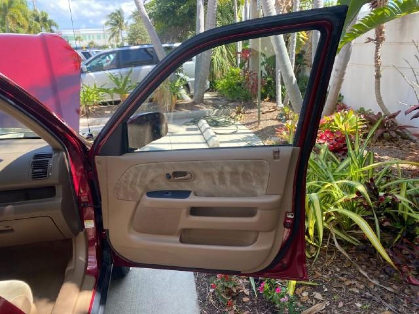 2004 Chianti Red Pearl /Saddle Honda CR-V EX AWD 1 OWNER LOW MILES 72,136 (JHLRD78804C) with an 2.4L DOHC PGM-FI 16-Valve i-VTEC I4 Engine engine, Automatic transmission, located at 4701 North Dixie Hwy, Pompano Beach, FL, 33064, (954) 422-2889, 26.240938, -80.123474 - OUR WEBPAGE FLORIDACARS1.COM HAS OVER 100 PHOTOS AND FREE CARFAX LINK 2004 HONDA CR-V EX VIN: JHLRD78804C043839 J H L R D 7 8 8 0 4 C 0 4 3 8 3 9 4 DOOR WAGON/SPORT UTILITY 2.4L I4 F DOHC GASOLINE ALL WHEEL DRIVE NO RECALLS Top Features 4WD/AWD Leatherette and Cloth Alloy Wheels Sunroof(s) Basic F - Photo#11