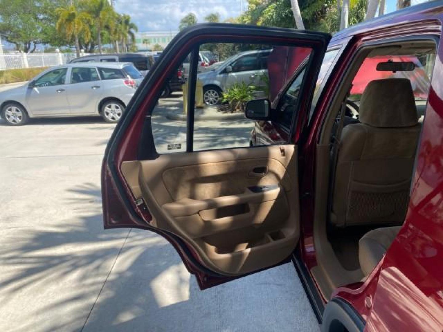 2004 Chianti Red Pearl /Saddle Honda CR-V EX AWD 1 OWNER LOW MILES 72,136 (JHLRD78804C) with an 2.4L DOHC PGM-FI 16-Valve i-VTEC I4 Engine engine, Automatic transmission, located at 4701 North Dixie Hwy, Pompano Beach, FL, 33064, (954) 422-2889, 26.240938, -80.123474 - OUR WEBPAGE FLORIDACARS1.COM HAS OVER 100 PHOTOS AND FREE CARFAX LINK 2004 HONDA CR-V EX VIN: JHLRD78804C043839 J H L R D 7 8 8 0 4 C 0 4 3 8 3 9 4 DOOR WAGON/SPORT UTILITY 2.4L I4 F DOHC GASOLINE ALL WHEEL DRIVE NO RECALLS Top Features 4WD/AWD Leatherette and Cloth Alloy Wheels Sunroof(s) Basic F - Photo#13