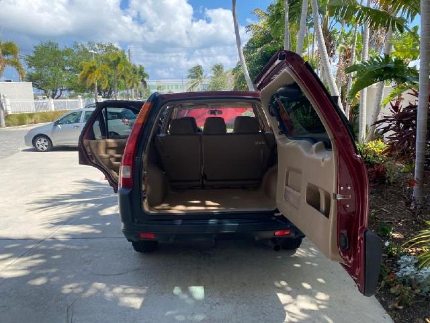 2004 Chianti Red Pearl /Saddle Honda CR-V EX AWD 1 OWNER LOW MILES 72,136 (JHLRD78804C) with an 2.4L DOHC PGM-FI 16-Valve i-VTEC I4 Engine engine, Automatic transmission, located at 4701 North Dixie Hwy, Pompano Beach, FL, 33064, (954) 422-2889, 26.240938, -80.123474 - OUR WEBPAGE FLORIDACARS1.COM HAS OVER 100 PHOTOS AND FREE CARFAX LINK 2004 HONDA CR-V EX VIN: JHLRD78804C043839 J H L R D 7 8 8 0 4 C 0 4 3 8 3 9 4 DOOR WAGON/SPORT UTILITY 2.4L I4 F DOHC GASOLINE ALL WHEEL DRIVE NO RECALLS Top Features 4WD/AWD Leatherette and Cloth Alloy Wheels Sunroof(s) Basic F - Photo#15