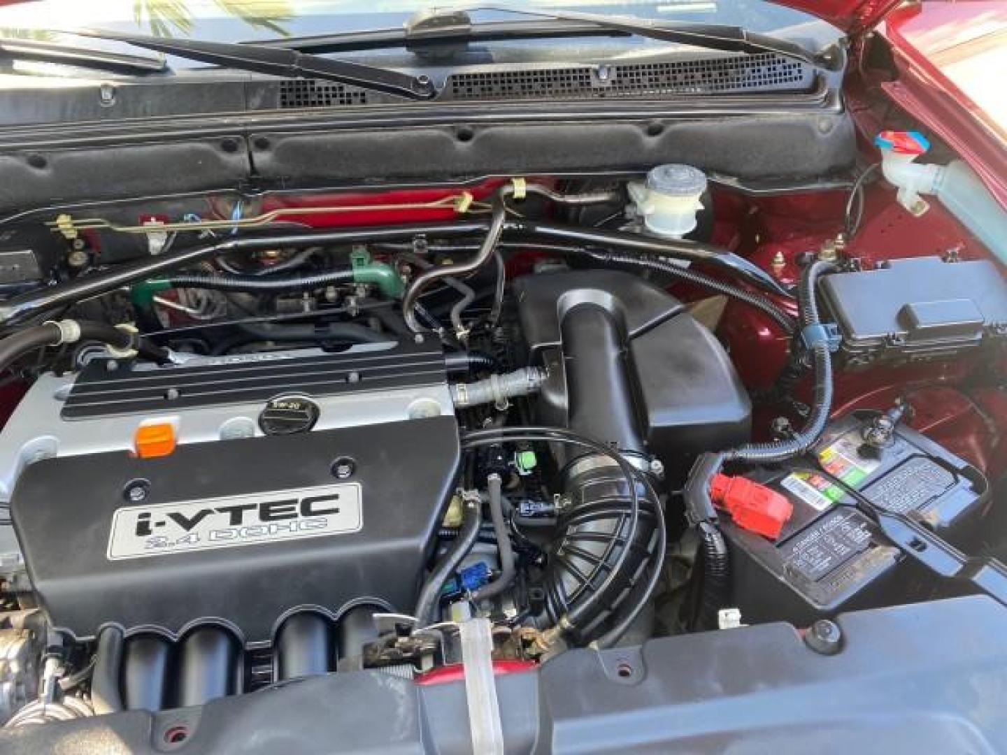 2004 Chianti Red Pearl /Saddle Honda CR-V EX AWD 1 OWNER LOW MILES 72,136 (JHLRD78804C) with an 2.4L DOHC PGM-FI 16-Valve i-VTEC I4 Engine engine, Automatic transmission, located at 4701 North Dixie Hwy, Pompano Beach, FL, 33064, (954) 422-2889, 26.240938, -80.123474 - OUR WEBPAGE FLORIDACARS1.COM HAS OVER 100 PHOTOS AND FREE CARFAX LINK 2004 HONDA CR-V EX VIN: JHLRD78804C043839 J H L R D 7 8 8 0 4 C 0 4 3 8 3 9 4 DOOR WAGON/SPORT UTILITY 2.4L I4 F DOHC GASOLINE ALL WHEEL DRIVE NO RECALLS Top Features 4WD/AWD Leatherette and Cloth Alloy Wheels Sunroof(s) Basic F - Photo#25