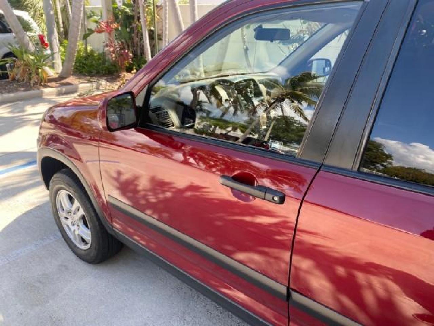 2004 Chianti Red Pearl /Saddle Honda CR-V EX AWD 1 OWNER LOW MILES 72,136 (JHLRD78804C) with an 2.4L DOHC PGM-FI 16-Valve i-VTEC I4 Engine engine, Automatic transmission, located at 4701 North Dixie Hwy, Pompano Beach, FL, 33064, (954) 422-2889, 26.240938, -80.123474 - OUR WEBPAGE FLORIDACARS1.COM HAS OVER 100 PHOTOS AND FREE CARFAX LINK 2004 HONDA CR-V EX VIN: JHLRD78804C043839 J H L R D 7 8 8 0 4 C 0 4 3 8 3 9 4 DOOR WAGON/SPORT UTILITY 2.4L I4 F DOHC GASOLINE ALL WHEEL DRIVE NO RECALLS Top Features 4WD/AWD Leatherette and Cloth Alloy Wheels Sunroof(s) Basic F - Photo#26