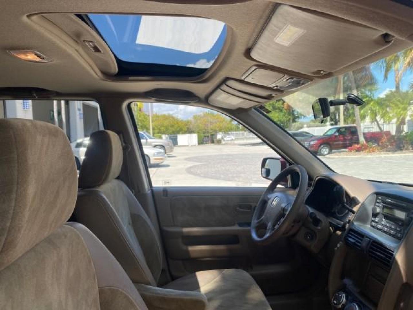 2004 Chianti Red Pearl /Saddle Honda CR-V EX AWD 1 OWNER LOW MILES 72,136 (JHLRD78804C) with an 2.4L DOHC PGM-FI 16-Valve i-VTEC I4 Engine engine, Automatic transmission, located at 4701 North Dixie Hwy, Pompano Beach, FL, 33064, (954) 422-2889, 26.240938, -80.123474 - OUR WEBPAGE FLORIDACARS1.COM HAS OVER 100 PHOTOS AND FREE CARFAX LINK 2004 HONDA CR-V EX VIN: JHLRD78804C043839 J H L R D 7 8 8 0 4 C 0 4 3 8 3 9 4 DOOR WAGON/SPORT UTILITY 2.4L I4 F DOHC GASOLINE ALL WHEEL DRIVE NO RECALLS Top Features 4WD/AWD Leatherette and Cloth Alloy Wheels Sunroof(s) Basic F - Photo#93