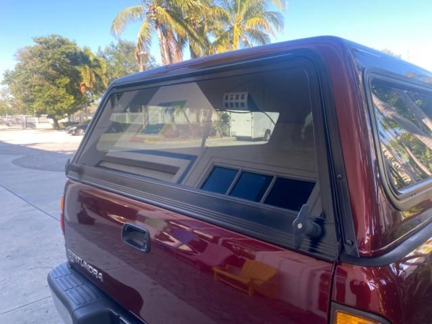 2003 Salsa Red Pearl /Gray Toyota Tundra SR5 LOW MILES 76,363 4.7 V8 (5TBRT34133S) with an 4.7L DOHC EFI 32-Valve V8 i-Force Engine engine, Automatic transmission, located at 4701 North Dixie Hwy, Pompano Beach, FL, 33064, (954) 422-2889, 26.240938, -80.123474 - OUR WEBPAGE FLORIDACARS1.COM HAS OVER 100 PHOTOS AND FREE CARFAX LINK 2003 TOYOTA TUNDRA SR5 CAMPER TOP WONT LAST IN STOCK VIN: 5TBRT34133S335959 5 T B R T 3 4 1 3 3 S 3 3 5 9 5 9 4 DOOR EXTENDED CAB PICKUP 4.7L V8 F DOHC 32V THE BEST GASOLINE REAR WHEEL DRIVE TOW PKG Top Features Alloy Wheels Leath - Photo#73