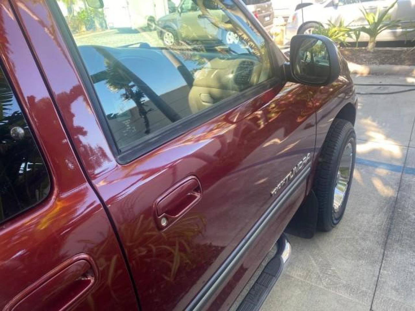 2003 Salsa Red Pearl /Gray Toyota Tundra SR5 LOW MILES 76,363 4.7 V8 (5TBRT34133S) with an 4.7L DOHC EFI 32-Valve V8 i-Force Engine engine, Automatic transmission, located at 4701 North Dixie Hwy, Pompano Beach, FL, 33064, (954) 422-2889, 26.240938, -80.123474 - OUR WEBPAGE FLORIDACARS1.COM HAS OVER 100 PHOTOS AND FREE CARFAX LINK 2003 TOYOTA TUNDRA SR5 CAMPER TOP WONT LAST IN STOCK VIN: 5TBRT34133S335959 5 T B R T 3 4 1 3 3 S 3 3 5 9 5 9 4 DOOR EXTENDED CAB PICKUP 4.7L V8 F DOHC 32V THE BEST GASOLINE REAR WHEEL DRIVE TOW PKG Top Features Alloy Wheels Leath - Photo#85