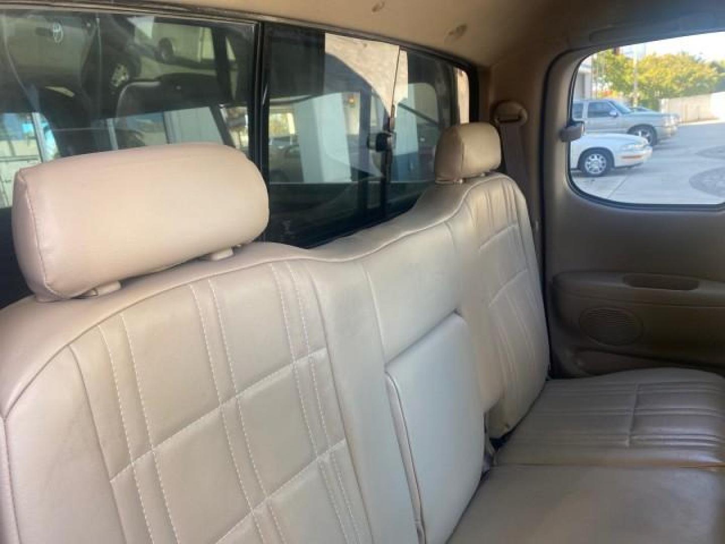 2003 Salsa Red Pearl /Gray Toyota Tundra SR5 LOW MILES 76,363 4.7 V8 (5TBRT34133S) with an 4.7L DOHC EFI 32-Valve V8 i-Force Engine engine, Automatic transmission, located at 4701 North Dixie Hwy, Pompano Beach, FL, 33064, (954) 422-2889, 26.240938, -80.123474 - OUR WEBPAGE FLORIDACARS1.COM HAS OVER 100 PHOTOS AND FREE CARFAX LINK 2003 TOYOTA TUNDRA SR5 CAMPER TOP WONT LAST IN STOCK VIN: 5TBRT34133S335959 5 T B R T 3 4 1 3 3 S 3 3 5 9 5 9 4 DOOR EXTENDED CAB PICKUP 4.7L V8 F DOHC 32V THE BEST GASOLINE REAR WHEEL DRIVE TOW PKG Top Features Alloy Wheels Leath - Photo#96