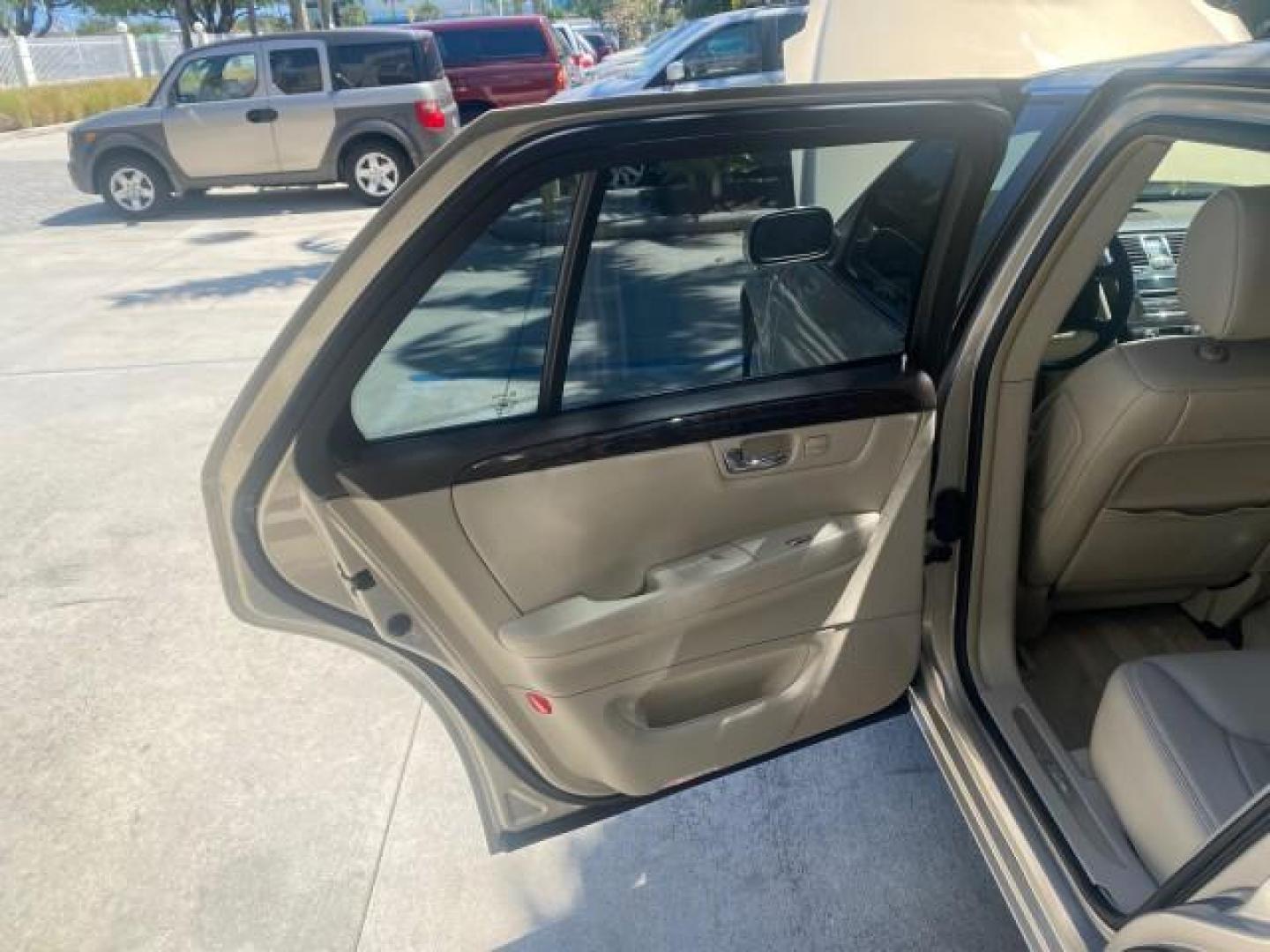 2008 Gold Mist /Shale/Cocoa Cadillac DTS w/1SB LOW MILES SUNROOF (1G6KD57Y38U) with an Northstar 4.6L DOHC V8 Engine engine, Automatic transmission, located at 4701 North Dixie Hwy, Pompano Beach, FL, 33064, (954) 422-2889, 26.240938, -80.123474 - OUR WEBPAGE FLORIDACARS1.COM HAS OVER 100 PHOTOS AND FREE CARFAX LINK 2008 CADILLAC DTS SUNROOF 1SB VIN: 1G6KD57Y38U159186 1 G 6 K D 5 7 Y 3 8 U 1 5 9 1 8 6 SEDAN 4 DR 4.6L V8 F GASOLINE FRONT WHEEL DRIVE Top Features A/C Seat(s) Luxury Package Alloy Wheels Memory Seat(s) BOSE Sound System Blind Spo - Photo#13