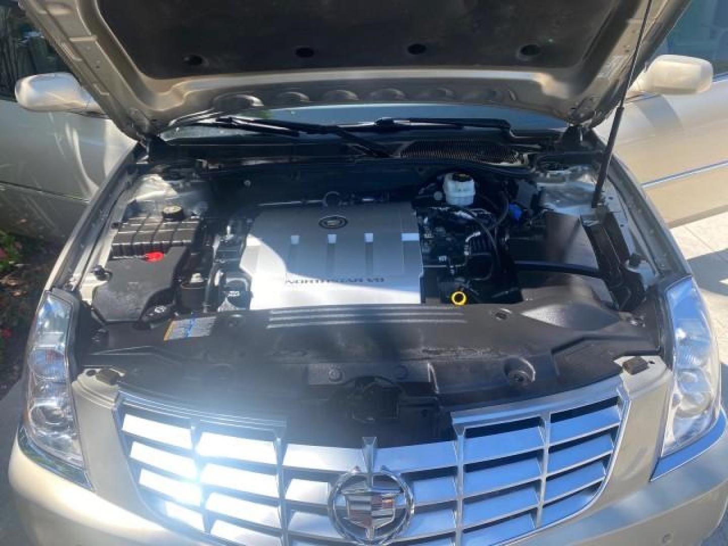 2008 Gold Mist /Shale/Cocoa Cadillac DTS w/1SB LOW MILES SUNROOF (1G6KD57Y38U) with an Northstar 4.6L DOHC V8 Engine engine, Automatic transmission, located at 4701 North Dixie Hwy, Pompano Beach, FL, 33064, (954) 422-2889, 26.240938, -80.123474 - OUR WEBPAGE FLORIDACARS1.COM HAS OVER 100 PHOTOS AND FREE CARFAX LINK 2008 CADILLAC DTS SUNROOF 1SB VIN: 1G6KD57Y38U159186 1 G 6 K D 5 7 Y 3 8 U 1 5 9 1 8 6 SEDAN 4 DR 4.6L V8 F GASOLINE FRONT WHEEL DRIVE Top Features A/C Seat(s) Luxury Package Alloy Wheels Memory Seat(s) BOSE Sound System Blind Spo - Photo#17