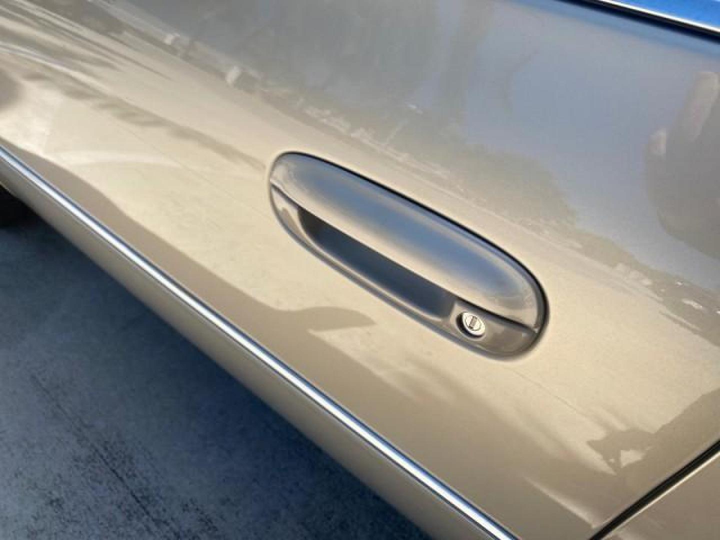 2008 Gold Mist /Shale/Cocoa Cadillac DTS w/1SB LOW MILES SUNROOF (1G6KD57Y38U) with an Northstar 4.6L DOHC V8 Engine engine, Automatic transmission, located at 4701 North Dixie Hwy, Pompano Beach, FL, 33064, (954) 422-2889, 26.240938, -80.123474 - OUR WEBPAGE FLORIDACARS1.COM HAS OVER 100 PHOTOS AND FREE CARFAX LINK 2008 CADILLAC DTS SUNROOF 1SB VIN: 1G6KD57Y38U159186 1 G 6 K D 5 7 Y 3 8 U 1 5 9 1 8 6 SEDAN 4 DR 4.6L V8 F GASOLINE FRONT WHEEL DRIVE Top Features A/C Seat(s) Luxury Package Alloy Wheels Memory Seat(s) BOSE Sound System Blind Spo - Photo#27
