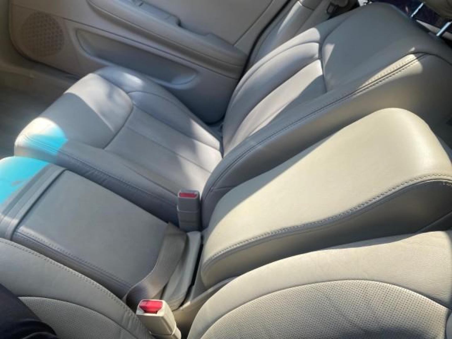 2008 Gold Mist /Shale/Cocoa Cadillac DTS w/1SB LOW MILES SUNROOF (1G6KD57Y38U) with an Northstar 4.6L DOHC V8 Engine engine, Automatic transmission, located at 4701 North Dixie Hwy, Pompano Beach, FL, 33064, (954) 422-2889, 26.240938, -80.123474 - OUR WEBPAGE FLORIDACARS1.COM HAS OVER 100 PHOTOS AND FREE CARFAX LINK 2008 CADILLAC DTS SUNROOF 1SB VIN: 1G6KD57Y38U159186 1 G 6 K D 5 7 Y 3 8 U 1 5 9 1 8 6 SEDAN 4 DR 4.6L V8 F GASOLINE FRONT WHEEL DRIVE Top Features A/C Seat(s) Luxury Package Alloy Wheels Memory Seat(s) BOSE Sound System Blind Spo - Photo#54