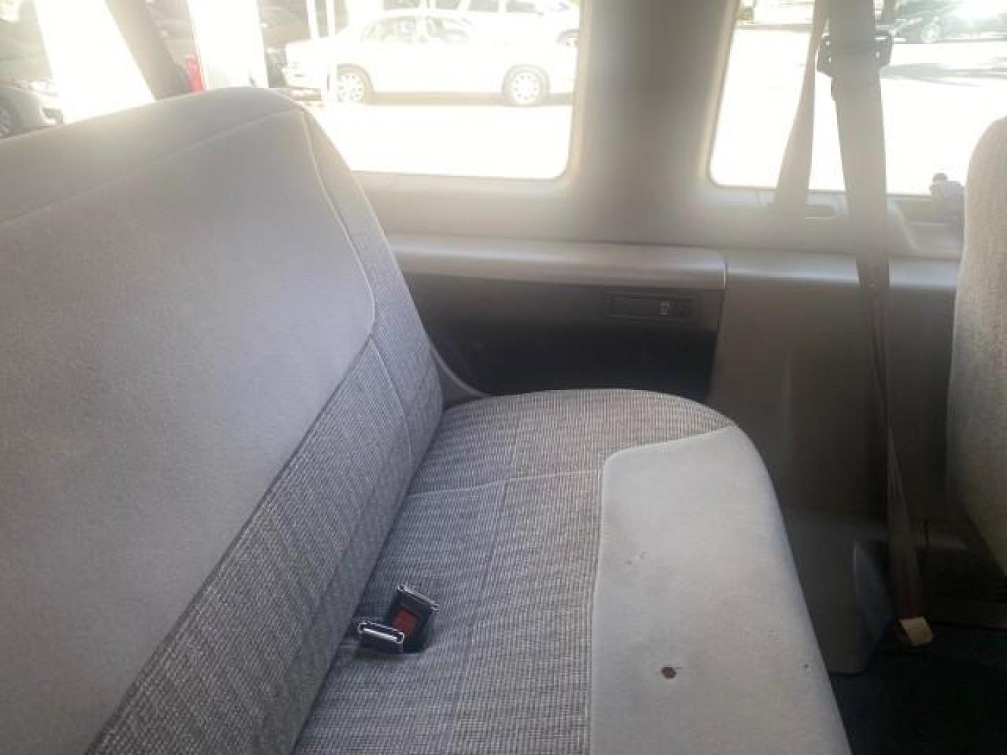 1999 Light Blue /Medium Parchment Ford Econoline Wagon XLT 15 PAS VAN EXT (1FBSS31S6XH) with an 6.8L EFI V10 Engine engine, Automatic transmission, located at 4701 North Dixie Hwy, Pompano Beach, FL, 33064, (954) 422-2889, 26.240938, -80.123474 - OUR WEBPAGE FLORIDACARS1.COM HAS OVER 100 PHOTOS AND FREE CARFAX LINK 1999 1999 FORD E-350 XL XLT SD 15 PASSENGER VIN: 1FBSS31S6XHB80914 VAN 6.8L V10 F SOHC 20V GASOLINE REAR WHEEL DRIVE Top Features Cloth Seats Basic Features ABS Brakes Air Conditioning Cassette Player Power Locks AM/FM Stereo Auto - Photo#99